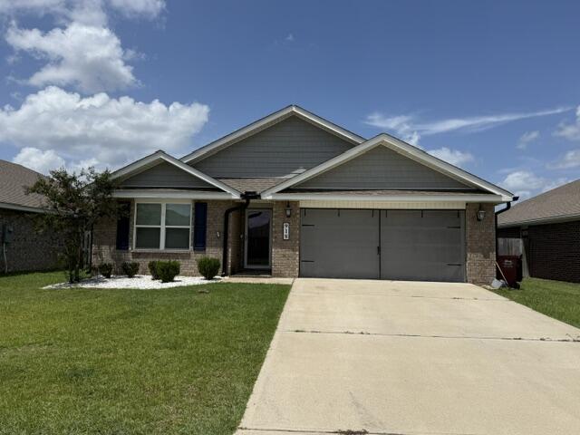 Available 08/17/2026 Avoid the electric deposit because this home features electric subsidy in the rental rate.  Move in ready before school starts, this great home located in Redstone Commons.  The ''Cali'' features 4 bedrooms and 2 bathrooms.  Open concept floor plan invites you down the spacious foyer upon entering.  Neutral colors and natural light encompass the home.  Exterior boasts a covered back porch, 2 car garage. The kitchen features a granite island with ship lap, stainless appliances, granite countertops + tiled backsplash.  Living room can accommodate large sectionals and furniture.  The master suite is located in the back of the home with walk in closets, separate shower, dual vanities and large enough for KING size furniture.   Community pool makes the summer fun easy and maintenance free.  Centrally located in Crestview to bases, beaches, shopping and schools.  No inside smoking or vaping in the home or garage.  Pets allowed with a $400 non-refundable pet fee and owner approval.
