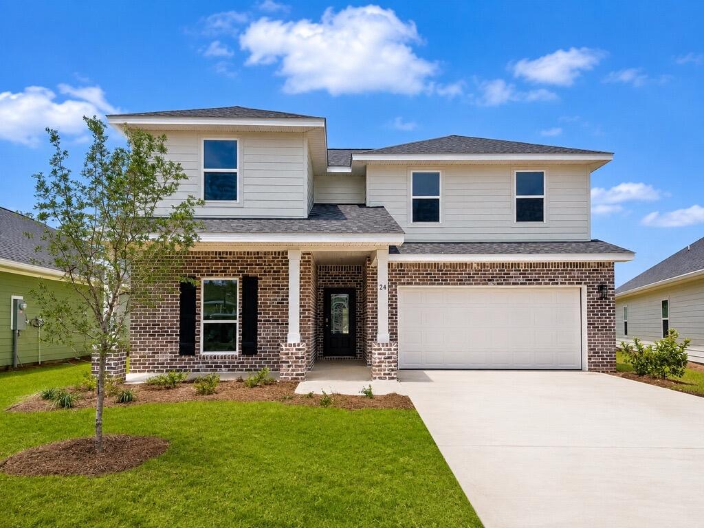 Welcome to 24 Foxtrail Run, a new home at Ashton Park Phase III in Freeport Florida. 

This home has just over 2,500 square feet through two stories, with 4 bedrooms with 3 bathrooms, a 2-car garage, and a seamless open layout. There is a covered front porch and entry door. 

As you enter the home, you are met with the foyer leading to the open concept living area. Just off the entry hall, you will find a guest bedroom featuring a full bathroom and the laundry room. Continuing through the foyer you enter the open concept living area including the kitchen, living room and dining space. The kitchen includes quartz countertops, under mount sink, smooth top range, stainless steel appliances, pantry, stylish shaker cabinetry, and a center island. With natural light and a beautiful water view of the pond under your covered back patio, the living and dining area are integrated perfectly.

At the back of the main living area is the primary bedroom. This bedroom is a spacious and relaxing room that includes an ensuite bathroom. The primary bathroom has a dual sink vanity, a separate water closet, shower and walk-in closet.

Returning to the foyer you will find stairs leading to the second floor. On the second level, there is an additional living area that could be used as a media room or study. There are two guest bedrooms on the second level as well as a full bathroom dual sink vanity and shower tub combination.