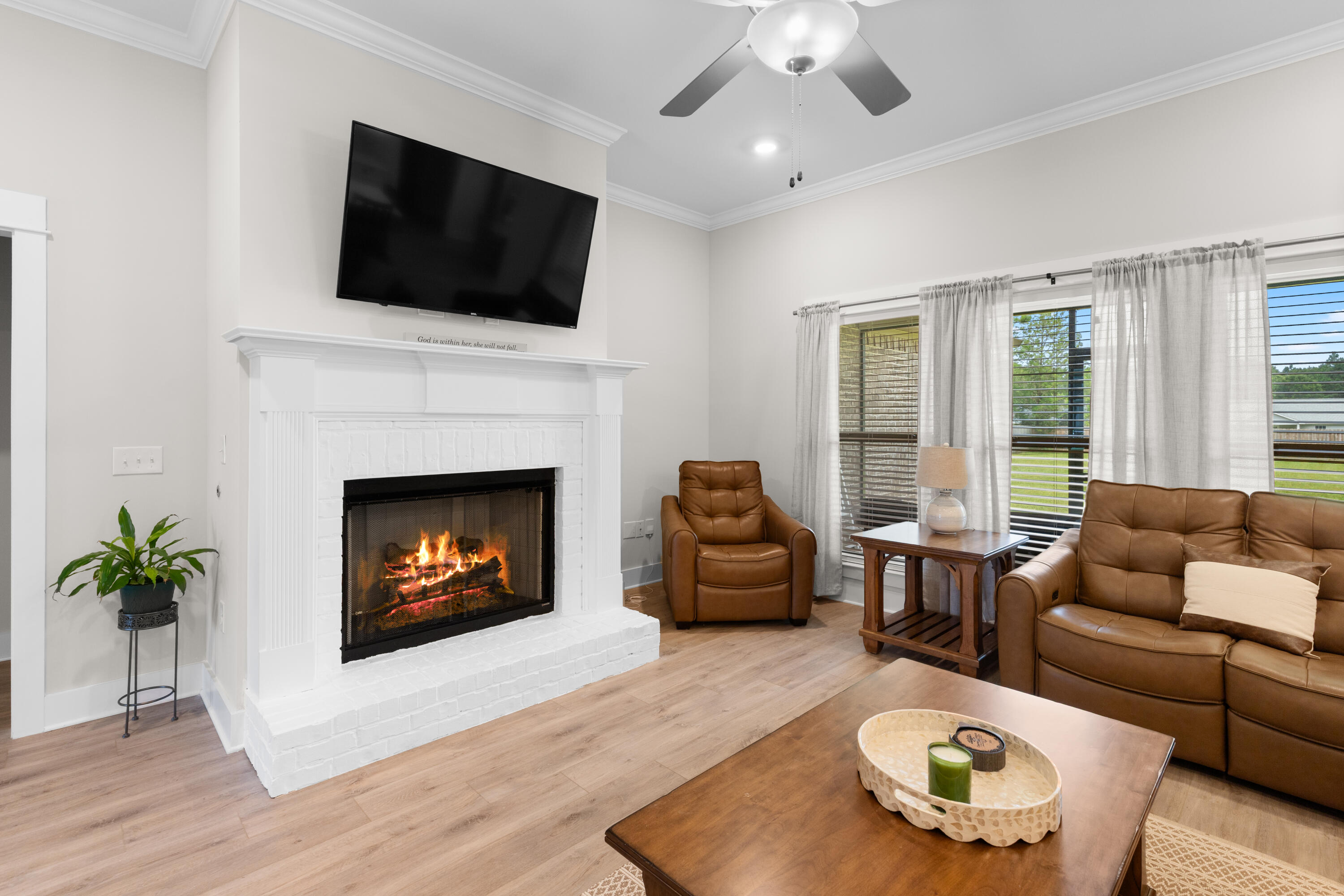 Nestled in Whitley Estates, a well maintained community in the heart of Pace, this home offers a low HOA and convenient access to beaches, shopping, dining, medical facilities, and NAS Whiting Field.

From the moment you step through the custom double mahogany front doors, it is clear that 6297 Howie Way is something special. Meticulously maintained and thoughtfully designed, this 2,540 sq ft, 4 bedroom, 3 bath home with a flex room blends elevated finishes with the warm, unhurried lifestyle that makes Pace one of Northwest Florida's most desirable communities.

The open floor plan feels expansive from the start, anchored by 10 foot ceilings in the living and dining areas and continuous EVP flooring that flows seamlessly through the main living spaces and primary suite.