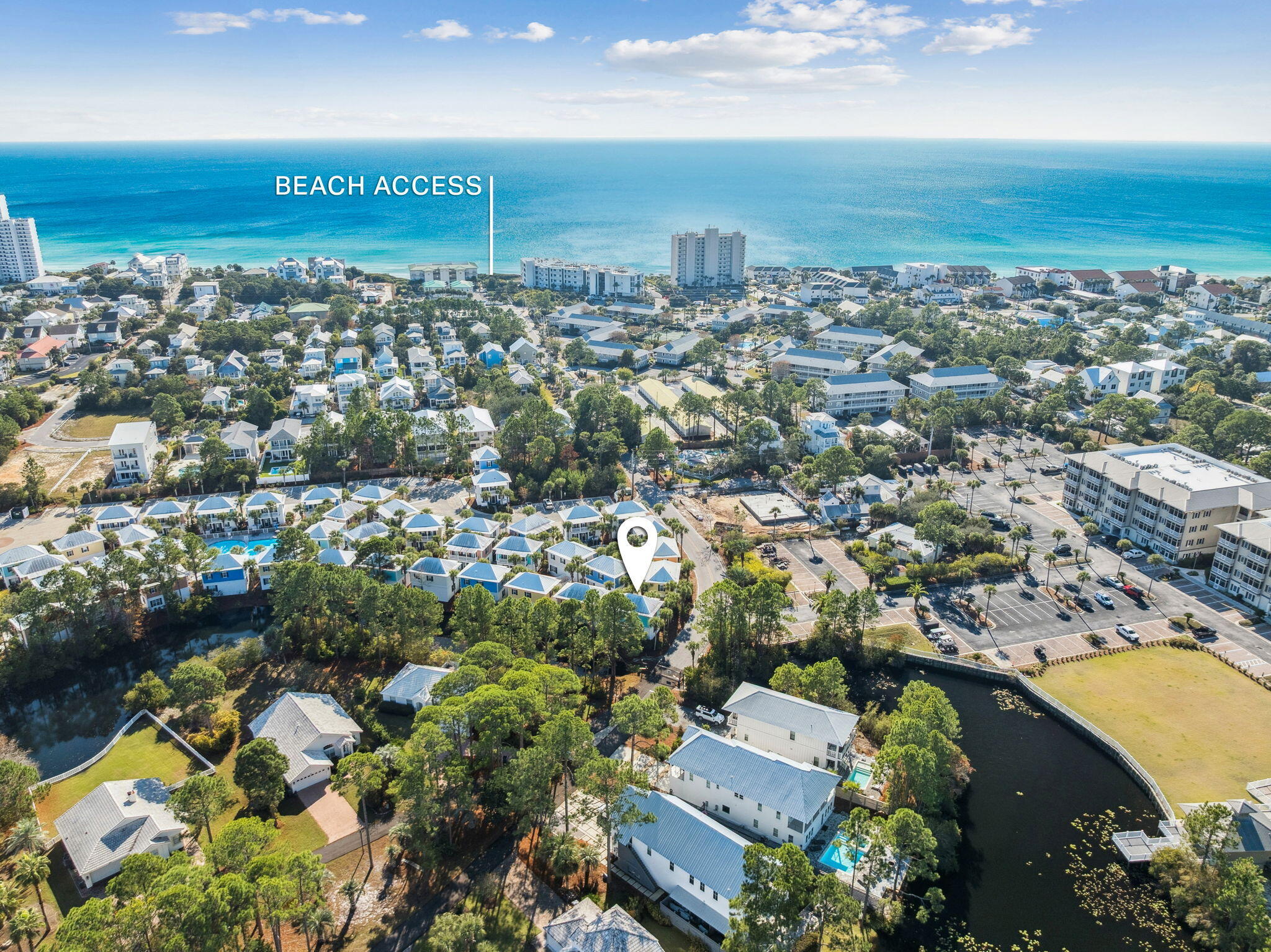 Welcome to 198 Somerset Bridge #101, a beautifully updated & TURNKEY coastal retreat in the sought-after Bungalows at Seagrove. This charming single-family home offers one of the most desirable settings in the community, tucked privately among lush landscaping & backing to a serene pond. The location is unbeatable--positioned near the front of the neighborhood for EASY ACCESS TO 2 PUBLIC BEACH ACCESSES...JUST DOWN THE ROAD! From your doorstep, you can be on the sand in minutes. Thoughtfully maintained inside & out, this FULLY FURNISHED home received extensive updates in 2023 including NEW LVP flooring throughout both levels, NEW quartz kitchen countertops, a FARMHOUSE SINK and fresh interior and exterior paint. A NEW HVAC