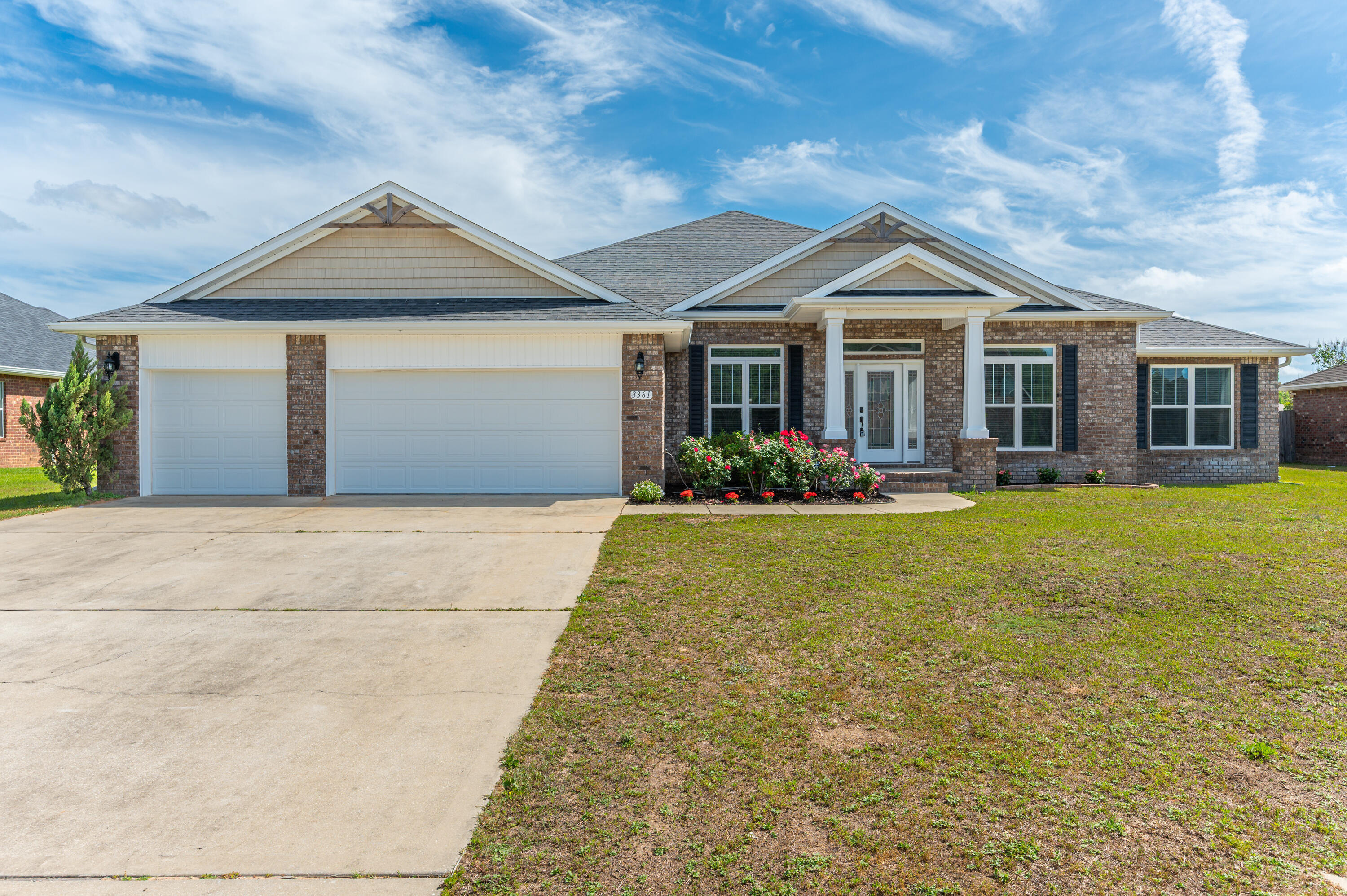 Beautifully maintained and move-in ready, this stunning home offers comfort, space, and convenience in Brownstone Manor, Crestview, FL. Featuring 3,002 sq ft, 4 bedrooms, 3.5 baths, and a 3-car garage on a manicured 0.50-acre lot. The open-concept design flows seamlessly between living, dining, and kitchen areas, ideal for daily living and entertaining. A single-story split floor plan ensures privacy, with a flexible office that can serve as a 5th bedroom. Durable luxury vinyl plank flooring runs throughout common areas and bedrooms, with tile in all bathrooms for easy maintenance. Elegant coffered ceilings add style and enhanced lighting. Upgrades include raised TV wiring, a built-in bookshelf in bedroom 3, and fresh interior paint for a clean, modern feel.