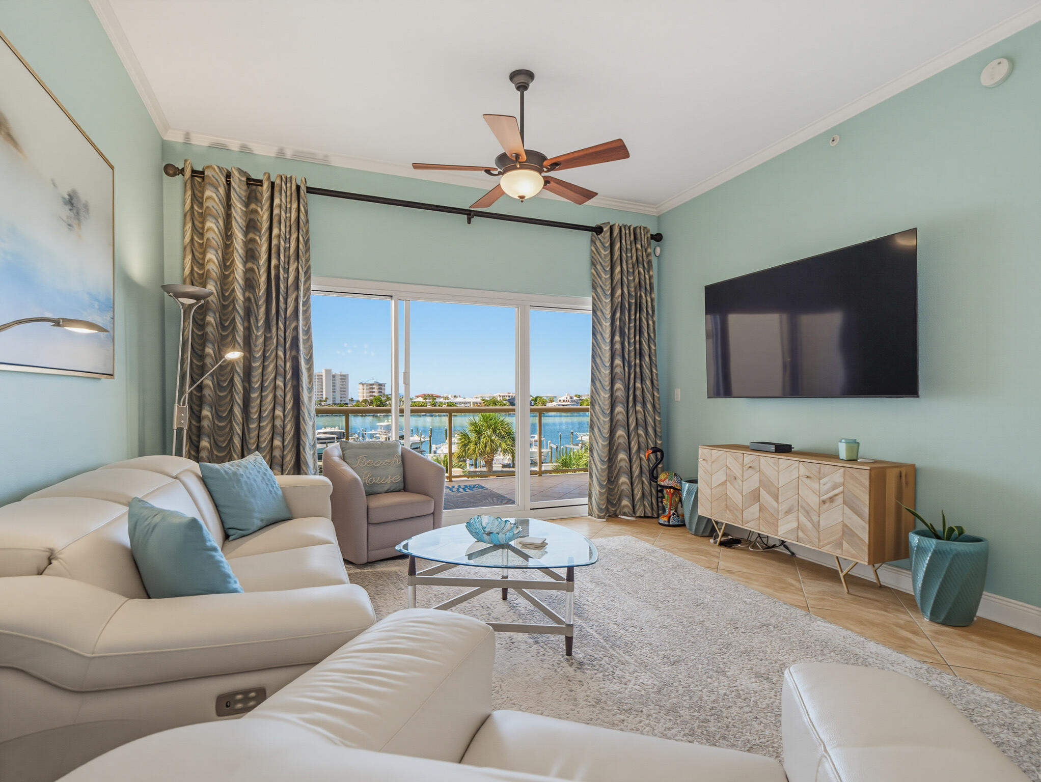 Seller is offering a $5,000 credit to buyer, which can be applied toward closing costs, prepaid expenses, rate buy-downs, or however the buyer chooses.
Positioned atop a 35-foot bluff overlooking the renowned Destin Harbor, this exceptional residence offers the convenience of first-floor access with the elevated perspective of a fourth-floor view. Located above the pool deck, the spacious balcony captures beautiful harbor vistas and stunning sunsets while providing a unique sense of privacy and elevation. Unit 1G stands apart from most Marbella residences, featuring natural gas service already extended to both the kitchen and balcony, complete with a built-in gas grill--an uncommon & highly desirable upgrade within the building.
Widely regarded as one of Destin's premier condominium developments, Marbella is known for its superior construction quality, backed by an outstanding structural engineering report. The association is professionally managed and offers comparatively low HOA dues for a luxury waterfront community.
Inside, the thoughtfully designed floor plan features a generously sized waterfront primary suite with direct access to a spacious ensuite bath and two oversized walk-in closets. Residents enjoy an active & welcoming atmosphere with regular homeowner-hosted gatherings throughout the year, including game nights, wine socials, & other community events. This residence conveys with two deeded premium covered parking spaces as well as an open air storage unit  conveniently located adjacent to the parking spots for paddle boards, kayaks, beach toys or chairs ect. There is an additional Large, secure private storage closet adjacent to your condos front door. Marbella is a non-short-term rental community, creating a quieter, more residential environment where owners primarily use their units as full-time residences or vacation homes.
Ideally situated in the heart of Destin, Marbella places you minutes from world-class boating, championship golf courses, waterfront dining, shopping, grocery stores, entertainment, and the sugar-white beaches that make the Emerald Coast famous.
