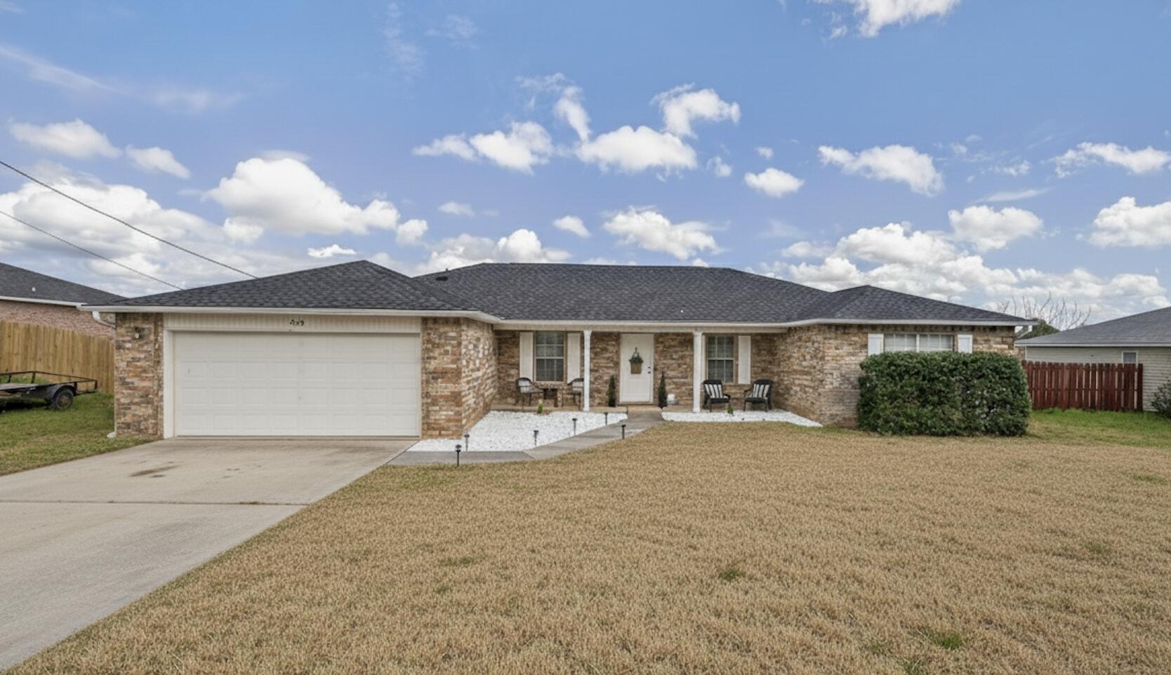 Step into this beautifully updated 4-bedroom, 2-bath home featuring a versatile flex room, formal dining area, and a bright eat-in kitchen! The kitchen features granite countertops and stainless steel appliances, offering both style and functionality. The spacious primary suite provides a relaxing retreat with primary bathroom that includes a garden tub, separate shower, and double vanity. Throughout the home you'll find wood-look flooring, updated lighting, board and batten accents in the hallway, and stylish accent walls in bedrooms.Enjoy morning coffee on your beautiful back deck just off the living room. Call your favorite realtor to schedule your private tour today!