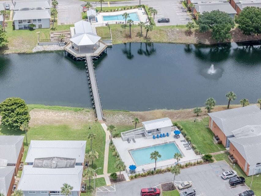 PORTFOLIO SALE - INDIVIDUAL UNIT PRICE ALLOCATED FOR MLS/COMP PURPOSES. Condo was sold as part of an 8-unit portfolio package transaction. The individual sales price shown reflects the allocated price for this unit within the portfolio transaction and is provided for comparable-sale purposes. The unit was not sold as an individual, stand-alone transaction. The property was sold fully furnished, AS IS, and is located in Gulf Terrace, a pet-friendly community with no rental restrictions and a strong history of appeal to both locals and tourists. Short-term rentals are permitted. Community amenities include two gated entrances from Highway 98 and Airport Road, three swimming pools, tennis/pickleball courts, a dog park, EV chargers, maintained green areas, picnic tables, and a lake. Free parking is available, and the community is not located in a flood zone. HOA includes building insurance and exterior maintenance, water, internet, sewer, trash, landscaping, and maintenance of the pools and gates. Portfolio Transaction: 8 condos total -- five 1BR units (153, 132, 232, 230, 240) and three 2BR units (221, 180, 130). All units were sold fully furnished, AS IS, as part of the package transaction.