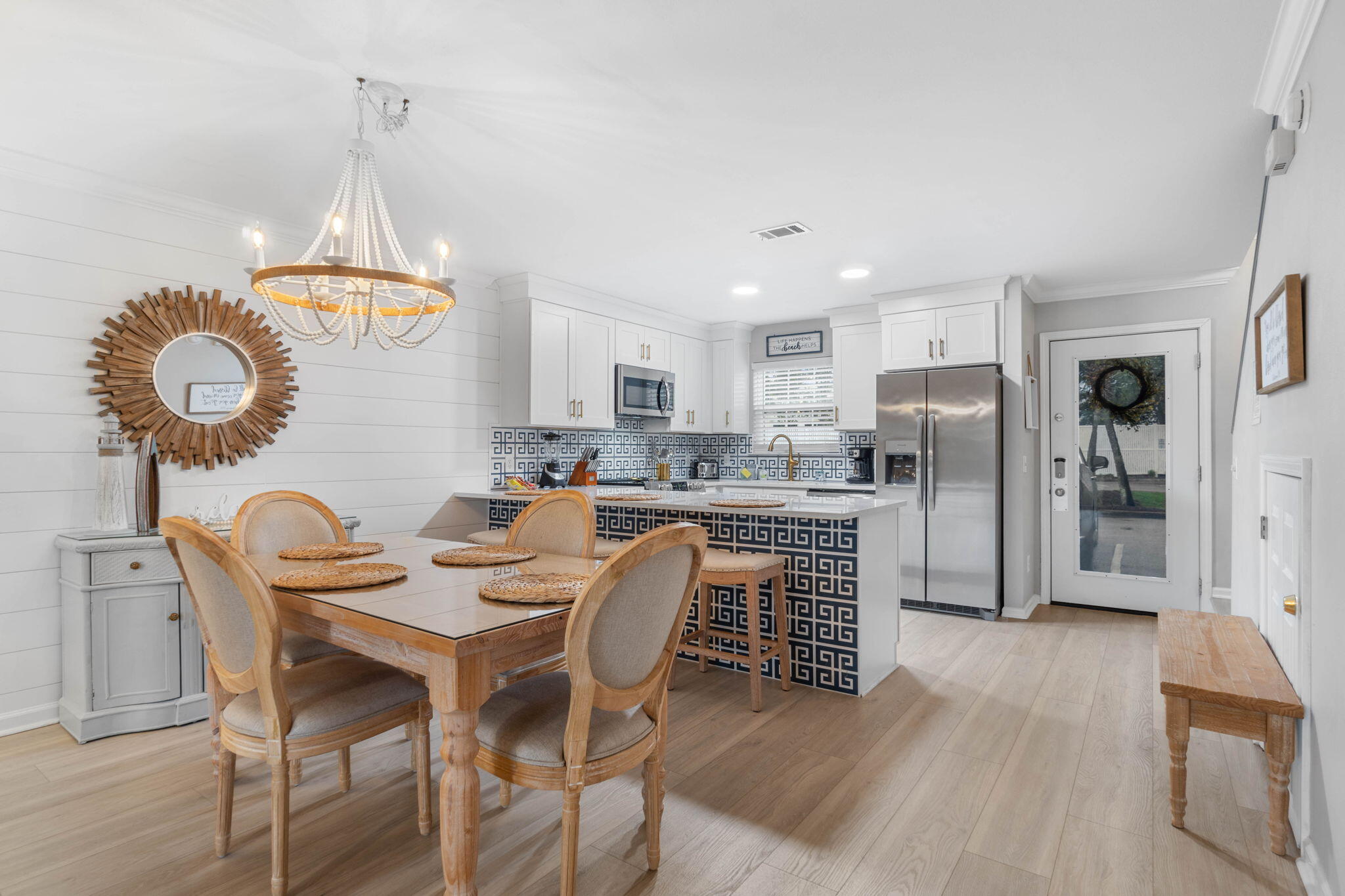 Flip-flops, salt air, and sunshine--welcome to Unit 15 (end unit), a freshly enchanted coastal townhome just a skip from the surf!! Ideally located between the GULF and the BAY this townhome checks all the boxes.  

Fully reimagined with Instagram-ready finishes & furnishings, luxe quartz counters, incredible tile throughout and whimsical built-in bunks that beg for sandy-studded stories, this home sparkles from every corner.  No detail has been overlooked!!

Two cozy upstairs bedrooms each with their own full bath, and a bright tiled kitchen that invites seaside gatherings. Step into the screened porch that overlooks a quiet wooded backdrop--your shady retreat after a day at the beach. The community pool sits practically at your doorstep, and water, sewer, garbage, and cable are covered by the association for effortless living.

Perfect as a rental-ready investment or a charming full-time residence, Unit 15 is poised in the heart of Miramar Beach--moments from Sandestin, the magic of 30A, countless restaurants, and Silver Sands Premium Outlets. Salt-kissed days and effortless nights--coastal living with personality.