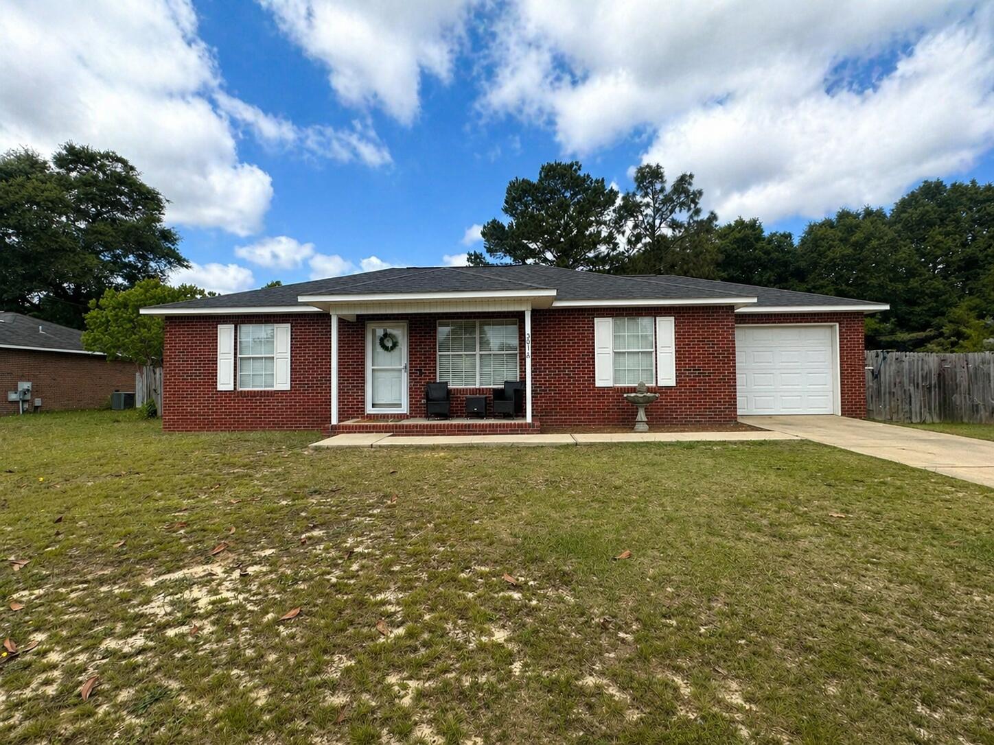 Welcome to this well maintained all brick 3-bedroom, 2-bath home, situated on a .26 - acre lot in North Crestview. With vinyl plank flooring throughout. The primary suite features a private bath with a walk in closet, creating a comfortable retreat. A desirable split floor plan, that includes an glass sliding door leading to the fully fenced backyard. The Kitchen is equipped with stainless steel appliances, and a large pantry.