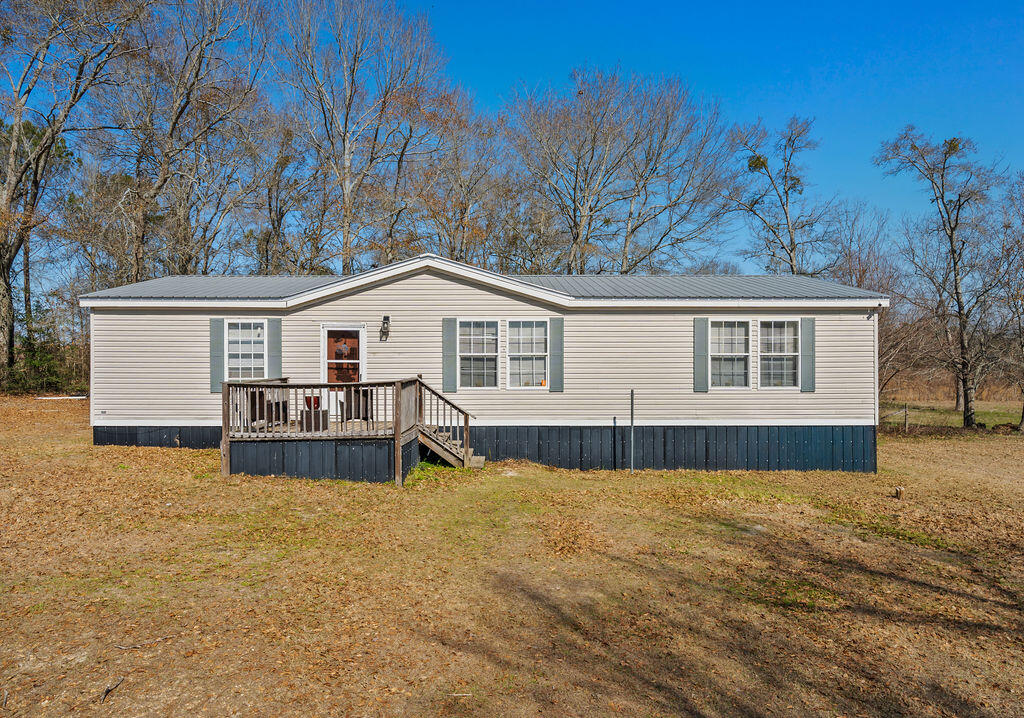 Enjoy peaceful country living in this charming 3-bedroom, 2-bath mobile home situated on 0.75 acres. With plenty of open space to relax and unwind, this property offers privacy and room to roam. Step out onto the large back porch — perfect for morning coffee, evening sunsets, or entertaining friends and family. If you're looking for quiet, comfortable living with a touch of country charm, this one is a must-see!