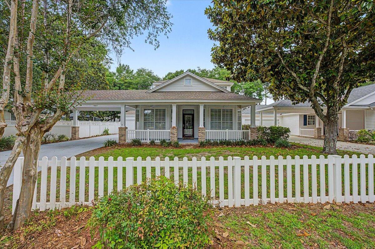 Welcome home to this charming Southern-style residence nestled in a picturesque, gated community.  Surrounded by majestic magnolia trees, you'll be greeted by their breathtaking beauty and the sensational fragrance that fills the air throughout the seasons. From the inviting curb appeal to the warm and welcoming atmosphere, this home embodies impeccable charm at its finest.

Enjoy peaceful strolls beneath a canopy of gorgeous magnolias, friendly neighbors, and a setting that feels like a step back to a simpler time. Whether relaxing on the porch with your morning coffee or entertaining family and friends, you'll love the character, comfort, and timeless appeal this special property offers. This is more than a home--it's a lifestyle defined by beauty, charm, and the unmistakable scent of magnolias.
*2019 Roof
*2023 Gas Water Heater
*2011 HVAC