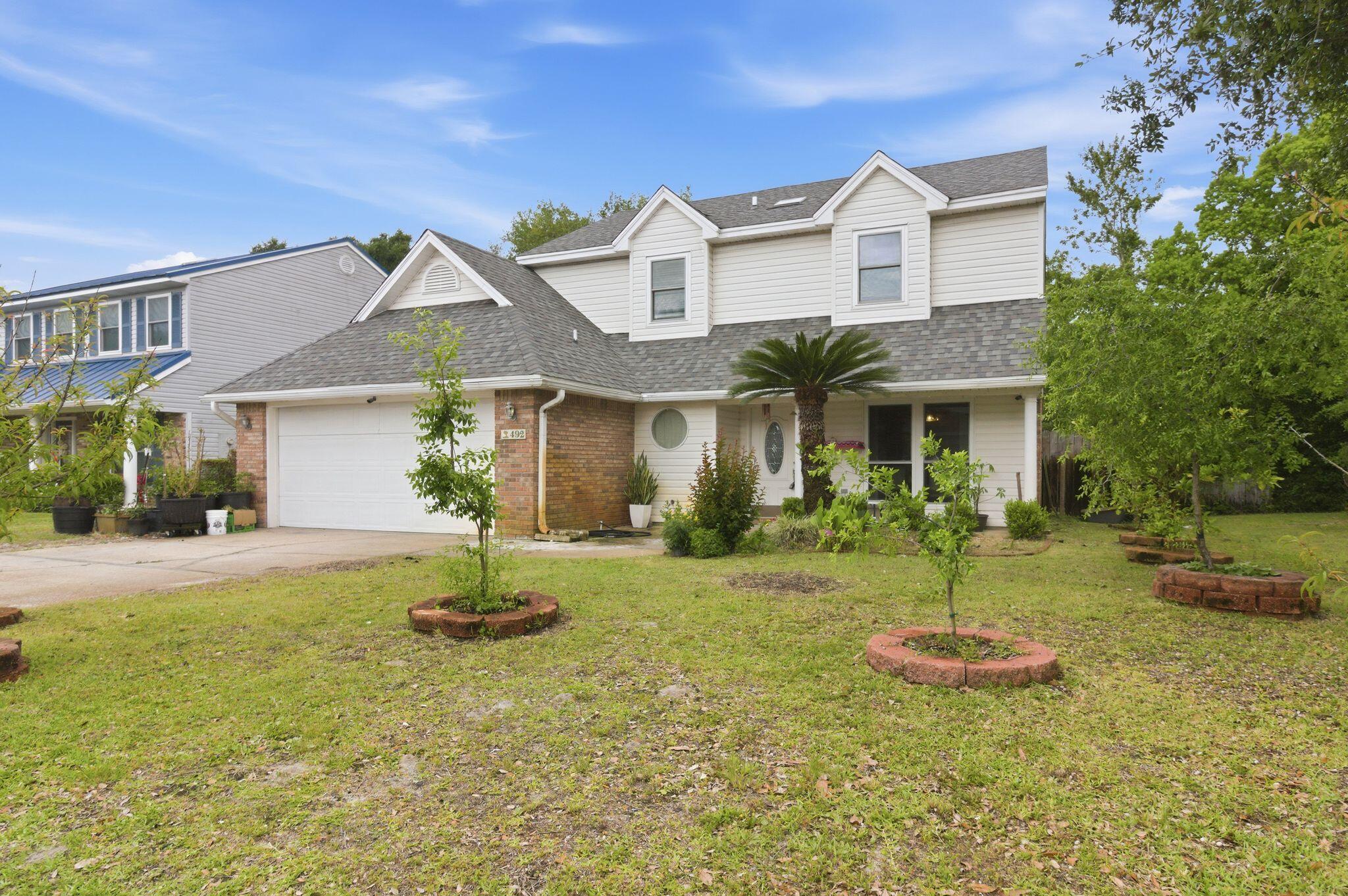 Located in a quiet subdivision, just 2 miles west of Hurlburt Field's front gate, an easy drive to shopping, dining and entertainment in Fort Walton Beach, and to the sugar white sands of Navarre Beach you could find your home sweet home in this Colonial style 2-story, 3 bedroom 2.5 bathroom home.  The first floor is complete with a large living room, separate dining room (or office), and spacious kitchen, and a half bath as well as patio area with access to the back yard. Upstairs you will find an incredible owner's suite, 2 large guest room and the guest bath.  The yard has been lovely cared for and is a gardeners paradise with fruit and flows galore!  Call your favorite Realtor and schedule a showing today!

Seller offering $5,000.00 towards buyers closing costs and/prepaid items.