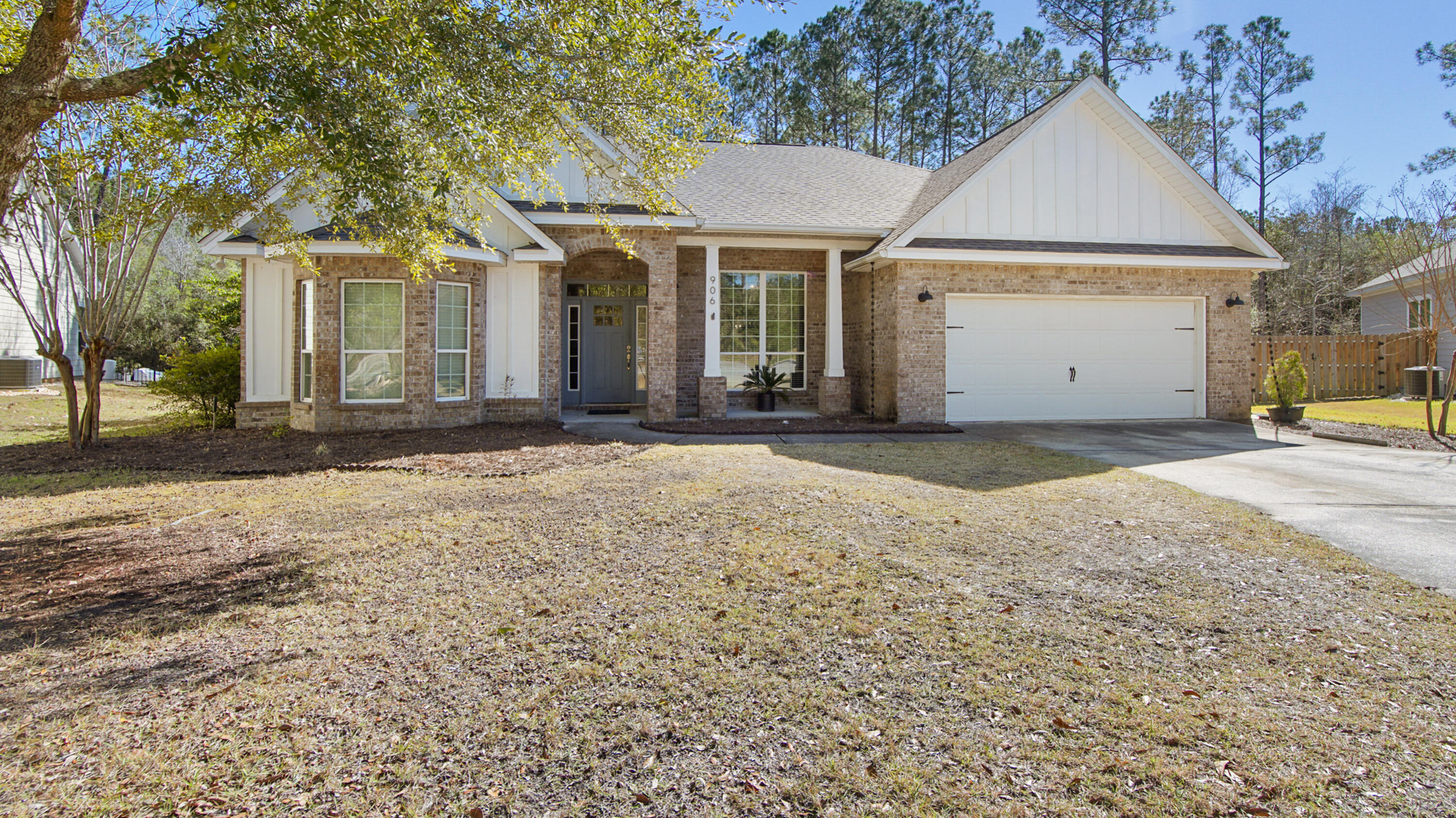 OVERSIZED LOT !! Take a look at this beautiful 3 bedroom, 2 bath home with bonus flex room. This 2357 sqft home in the Symphony Neighborhood sits on a large 0.57 acre lot that backs up to a wooded area; it is located at the end of the cul-de-sac.  Plenty of room to add your very own pool! No carpet here to replace, the flooring is all bamboo. The fireplace, built in bookshelves and trey ceilings complete the cozy living room. The kitchen appliances are stainless steel with a gas stove and pantry. Just off the kitchen step into the spacious Primary Bedroom, with sitting area and separate entrance to the patio.  The ensuite bathroom boasts a large walk in closet, shower and double vanities. Enjoy your time on the large covered patio deck watching your favorite team on TV, grilling out or just relaxing. Don't forget to check out the tree house, the perfect hiding spot. The 12x8 shed will keep your things tidy and out of sight. A custom concrete pad on the other side of the yard was made for fun bonfire nights. The two car garage will provide additional space for vehicles and toys. Back inside, at the front of the home, the bonus room with doors can provide an additional guest bedroom, office or work out space. Two additional bedrooms, full bathroom and laundry can also be found on this side of the home. The AC was replaced Summer 2025. Get ready to experience all that the Hammock Bay Community has to offer.