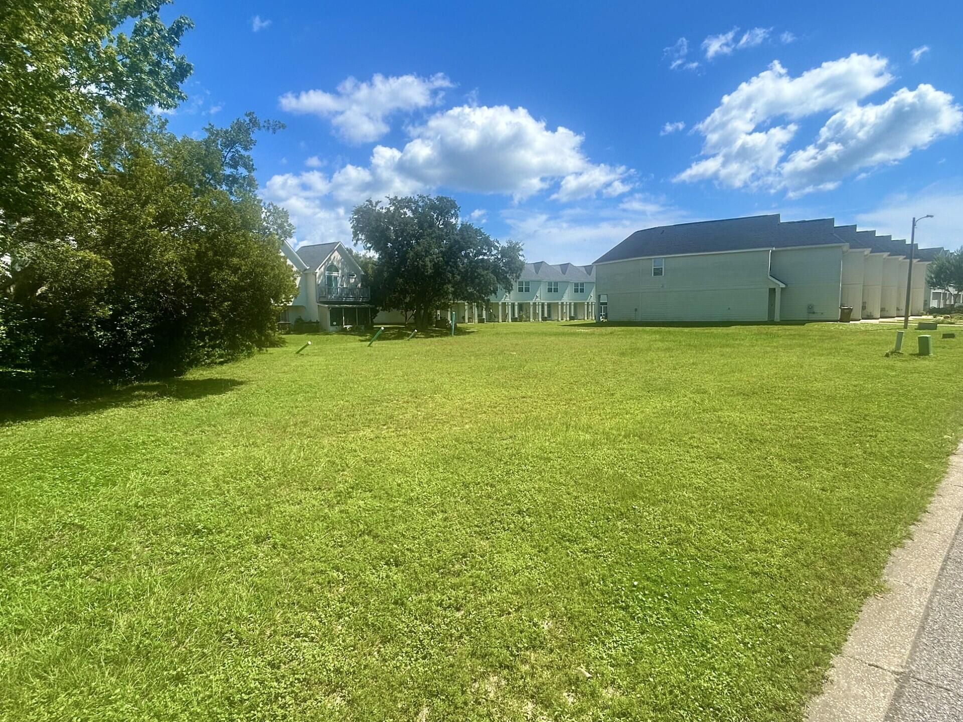 Great opportunity for developer or builder on this parcel of four town home lots located in a well-established and popular Navarre waterfront community on the Navarre end of East Bay Blvd. 

These are the only remaining four lots in this highly sought after waterfront development offering private community beach access, swimming pool, kayak racks, a low HOA of only $140 per lot, per month, and a championship 18-hole golf course just across the street. 

These lots already have water and sewer tap fees paid for each lot, along with access to underground utilities throughout neighborhood. 

Easy to work with HOA board with multiple building options for style, size, and two to four bedroom options for your particular build. 

Seller will also include previously approved town home plans with full price offer. 

Jump on this opportunity today and start building your next project without a lot of the wait time associated without other properties.