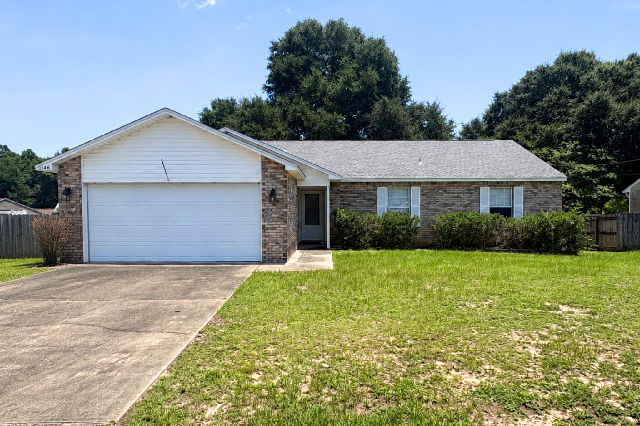 Welcome home to this charming 3-bedroom, 2-bath brick and vinyl siding home conveniently located just off Hwy 90 in Crestview. This well-built home offers a functional layout, desirable features, and the opportunity to add your personal touches to make it truly your own.

The spacious great room features a vaulted ceiling, creating an open and inviting feel, while the kitchen offers stainless steel appliances, ample cabinet space, and a large pantry. The primary suite includes a trey ceiling, walk-in closet, and private bathroom with dual vanities and a shower/tub combination. The home features LVP flooring throughout the main living areas and primary bedroom, tile in the kitchen and bathrooms, and carpet in the additional bedrooms.

Enjoy the outdoors in the large privacy-fenced backyard with a cozy deck, perfect for relaxing or entertaining. Additional features include a 2-car garage, 2021 roof and 2019 HVAC. With a great foundation and desirable features already in place, this home is ready for someone to bring out its full potential.