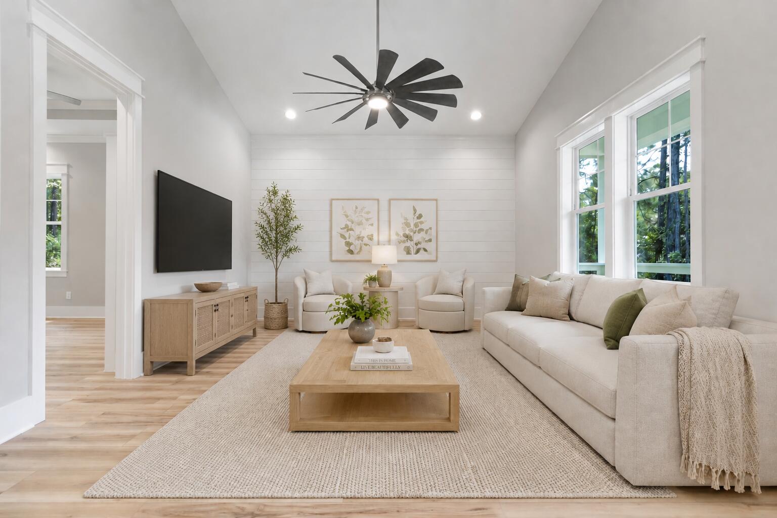 This beautifully finished 3 bed, 2.5 bath home offers 1,372 sqft of stylish comfort just 10 minutes from the beach! Featuring LVP flooring, tile showers, shiplap accents, vaulted and trey ceilings, crown molding, and plenty of room for a fenced backyard -- all with no HOA. Prime location near the bay and the future Chat Holley park & amphitheatre makes it perfect as a full-time home or a high-performing rental! Construction complete as of May of 2026! Seller will install a wood privacy fence with an acceptable offer. Watch the Youtube video here: https://www.youtube.com/watch?v=KK6thdyELSs