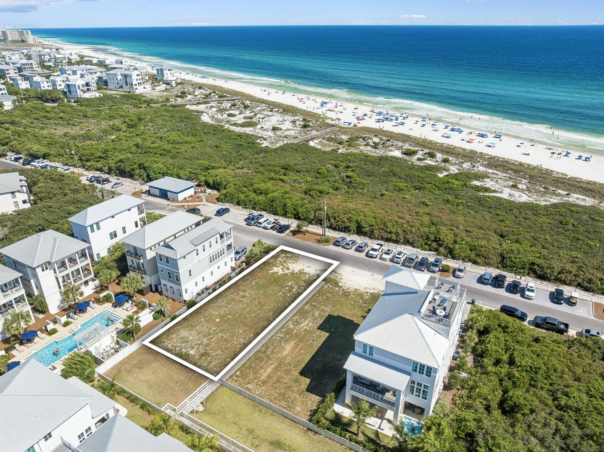 A rare opportunity to build your dream coastal retreat steps from the Gulf. Situated in Shoreline Estates at Inlet Beach, this lot offers stunning Gulf views and sits directly across from the sugar-white sands and emerald waters that define 30A living. Surrounded by newly constructed luxury homes, the neighborhood sets a striking precedent for what can be built here. A multi-story design would capture sweeping Gulf views from every level. 

Inlet Beach remains one of the most sought after beach communities affording residents with a quaint coastal town flair while remaining geographically poised minutes from the iconic town center of Rosemary Beach in addition to all of the world class dining and entertainment venues 30A has to offer.