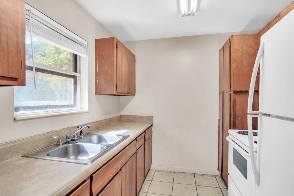 This 1,000 square foot, 3-bedroom, 1-bath brick home in Milton, Florida offers a solid opportunity for investors or buyers seeking a low-maintenance property with key system updates already in place. The durable brick exterior is complemented by a metal roof installed in 2015, providing long-term reliability and reduced insurance concerns. Inside, the functional floor plan maximizes space, while the HVAC system was replaced in 2023, offering improved efficiency and peace of mind.

The property sits on a generous lot with a spacious, fully fenced backyard—ideal for tenants, pets, or future enhancements.  This home is well-positioned for consistent rental demand. With strong fundamentals and recent capital improvements,
