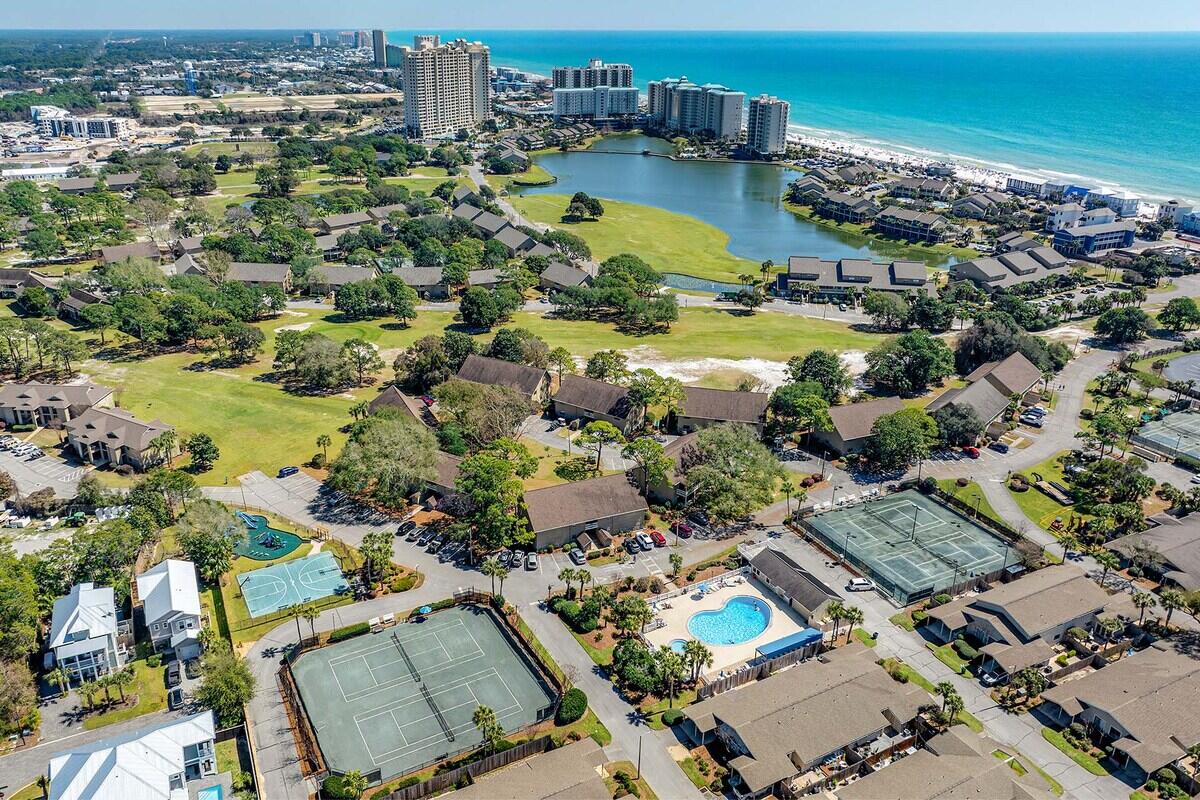 Welcome to Unit 76A in the highly sought-after Tennis Village at the gated Seascape Resort, where resort-style living meets exceptional investment potential. Ideally positioned just steps from the tennis courts and Seascape's only heated pool, this beautifully maintained villa offers one of the most desirable locations within the community. Whether you're looking for a full-time residence, vacation getaway, or income-producing rental, Unit 78A checks every box. The spacious floor plan features soaring vaulted ceilings that create a bright, open atmosphere, while the private courtyard provides the perfect setting for morning coffee or relaxing after a day at the beach. A dedicated carport includes electrical service ready for a golf cart, and washer/dryer hookups add everyday convenience.
 Seascape Resort is renowned for its outstanding amenities, including championship tennis and pickleball courts, four community pools, a new playground, and a scenic 7-minute walk to over 2,000 ft of deeded sugar-white beach access. Owners also enjoy exclusive beach parking just steps from the popular Whale's Tail Beach Bar & Grill. Properties in Tennis Village are consistently in demand thanks to their unbeatable location, strong vacation rental appeal, and access to one of Miramar Beach's premier resort communities. Whether you're seeking personal enjoyment or an investment with excellent rental potential, Unit 78A offers an outstanding opportunity to own a piece of Florida's Emerald Coast! The beaches at Seascape Resort are meticulously maintained, ensuring they remain clean, safe, and inviting for every visitor. Guests can take advantage of comfortable beach chairs and umbrellas set up daily by the resort, making it easy to unwind without a worry. Whether you're indulging in a moment of calm or enjoying a lively day with beach volleyball and paddleboarding, there are activities for everyone to enjoy.
One of the unique highlights of Seascape Resort's beaches is their accessibility and convenience, providing a serene and exclusive environment even during peak seasons. With restaurants and tiki bars just steps away, you can seamlessly transition from relaxing on the sand to enjoying fresh seafood or a refreshing tropical drink. Seascape Resort's beaches deliver the perfect blend of relaxation, adventure, and luxury, making it a must-visit destination for anyone visiting the Emerald Coast.