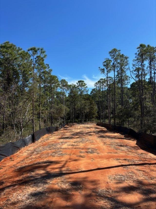 Rare opportunity to build your Dream home/Estate on a peaceful and private 4+/- acre
site, located between Gulf Breeze and Navarre, South of highway 98.
Driveway area is cleared and padded.
Wetland maps and property maps are available in the listing documents and photos.
All information is deemed reliable but is NOT warranted or guaranteed by seller or listing
Broker.
Buyer(s) and Buyer's Broker are responsible to conduct their own due diligence and
confirm all information including but not limited to acreage, measurements utilities,
zoning and suitability.
Owner licensed Real Estate Broker in the state of Florida. Call Owner/Agent Mike Burgess 850.687.7179 with all questions