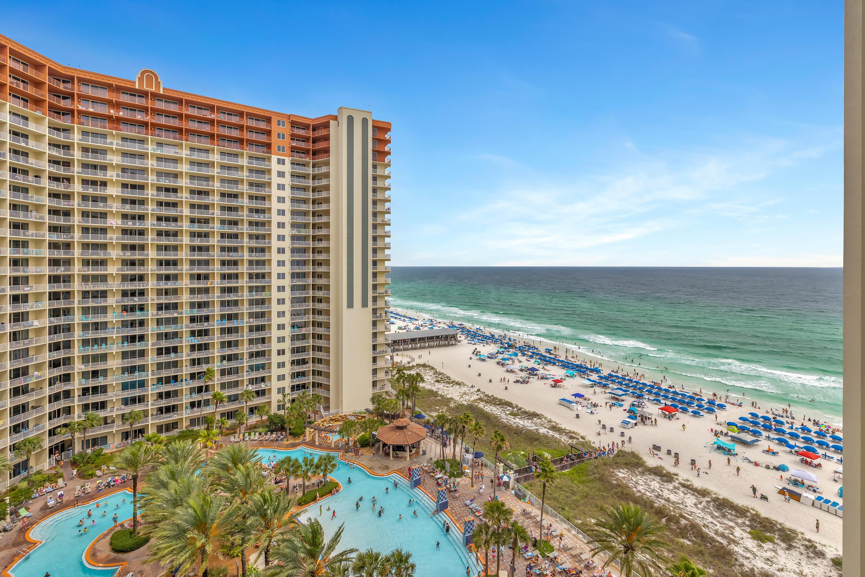 SELLER FINANCING AVAILABLE. FIFTH-FLOOR DEEDED PARKING. TWO BEDROOMS PLUS BUNK AREA WITH THREE FULL BATHROOMS.
Shores of Panama Unit 1207 in Panama City Beach, Florida offers a smart, rental-ready floor plan with the kind of practical features buyers notice quickly. This desirable 'B' floor plan features two bedrooms, a bunk area, and three full bathrooms, giving the layout more flexibility than a typical two-bedroom condo.
One of the standout advantages of Unit 1207 is the fifth-floor deeded parking space, offering convenient access within the resort's parking structure. Owners and guests also have the option to drive up to the 12th floor to take advantage of additional parking when available, adding another layer of convenience for this higher-floor residence.
Positioned on the west side of the building, Unit 1207 features balcony views of the resort-style lagoon pool along with coastline views across Panama City Beach. The condo is being offered fully furnished and rental-ready, with a full-size front-load washer and dryer, black appliances, fresh paint, wood flooring throughout the main living areas, and tile in the kitchen and bathrooms. An owner's closet adds valuable private storage, a detail that can make a meaningful difference for personal use or rental ownership.
The owner currently self-manages the property, offering flexibility for future owners who wish to continue self-management or select their preferred rental management company. Shores of Panama Resort features one of Panama City Beach's most recognizable gulf-front lagoon pool settings. The zero-entry tropical pool includes palm-lined islands, fountains, and a spacious hot tub set along the resort's private beachfront access. Additional amenities include an indoor heated pool and hot tub, a 24-hour fitness center, and a seasonal poolside tiki bar.
Located in the heart of Panama City Beach, Shores of Panama places dining, shopping, and entertainment nearby. Pineapple Willy's is adjacent to the resort, while Laketown Wharf directly across the street offers several dining, retail, and entertainment options, including Wharf Seafood Buffet, The Candymaker Ice Cream Shop, PCB Pizza, In Cahoots, The Press, The Bun Lab, 810 Billiards & Bowling, salon services, and more.
Panama City Beach has also welcomed several newer attractions and entertainment venues, including Dolly Parton's Pirates Voyage Dinner & Show, Topgolf, McGuire's Irish Pub, and Tootsie's Orchid Lounge.
HOA dues are $4,419.50 per quarter. All information, including HOA fees, is deemed reliable but should be verified by buyers if important.