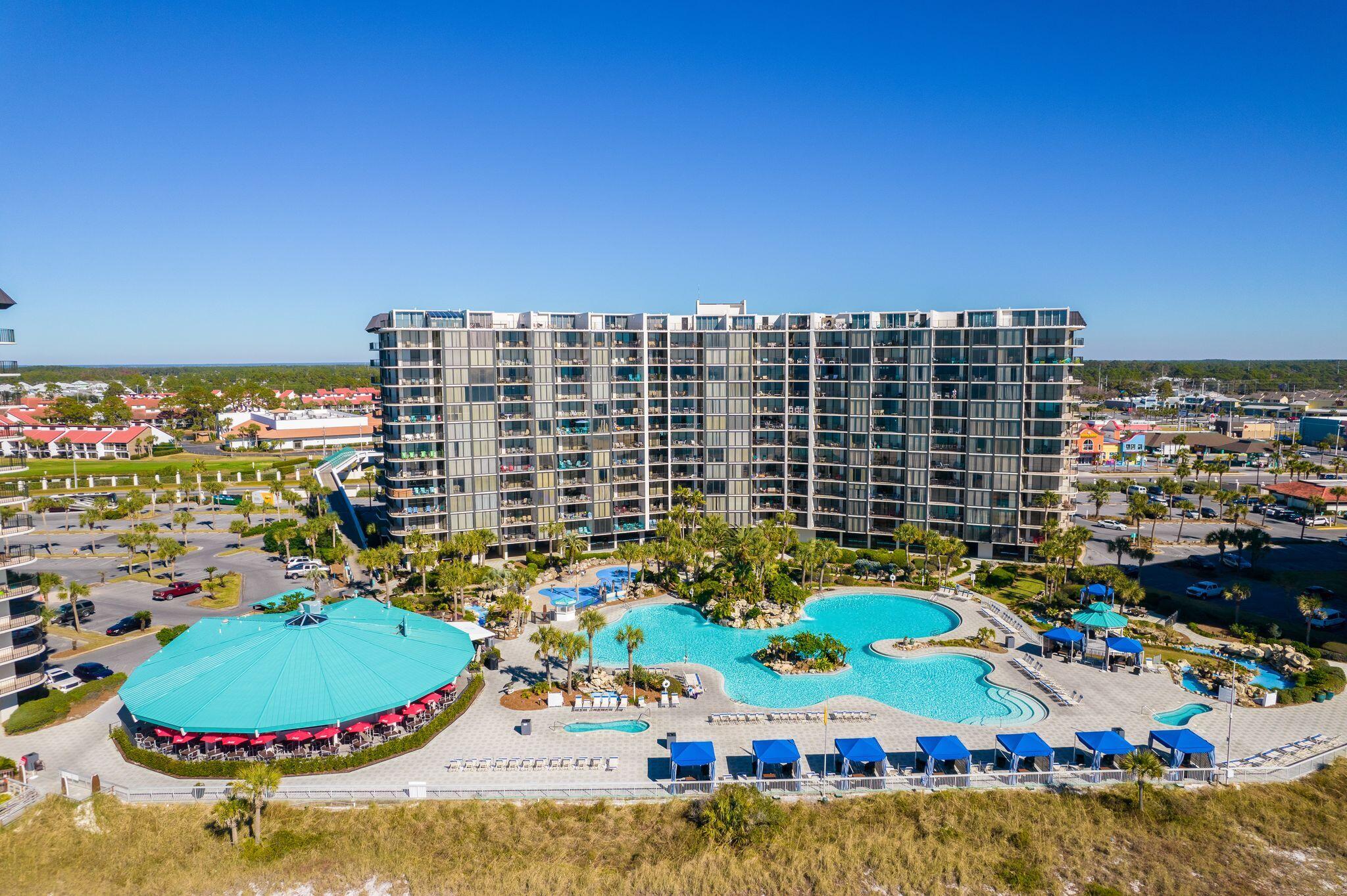 Welcome to Edgewater Beach Towers, one of Panama City Beach's most iconic Gulf-front resort communities! Ideally located on the first floor of desirable Tower I, Unit 103 offers the convenience of easy access to the beach, 11,500 sq. ft. lagoon-style resort pool and resort amenities--making it an excellent choice for a vacation home, second home or short-term rental investment. This spacious 3BR/3BA unit offers an updated kitchen with granite countertops & stainless steel appliances, oversized bedrooms, and a balcony overlooking the resort pool and beautiful gulf. Edgewater is known for its impressive resort-style amenities and prime location in the heart of PCB. Spend your days along the resort's private white-sand & turquoise waters beach. The resort also offers an executive Par-3 golf course, tennis and pickleball courts, spa, fitness center, basketball, shuffleboard and more. On-site dining and conveniences, including Ocean's Bar & Grill, make it easy to enjoy your stay without ever leaving the resort. Beyond the gates, you'll be just minutes from some of Panama City Beach's most popular dining, shopping and attractions, including Shipwreck Island Waterpark, Pier Park and the area's many entertainment and water activities.
Whether you're looking for your own beach getaway or an investment property in an established vacation rental destination, Unit 103 offers an opportunity to own in one of PCB's most amenity-rich Gulf-front resorts.