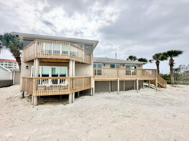 AVAIL: 7/28, preferably 6 mo. 1 day - 12 mo.  lease term w/ some flexibility. S/D = $4K, can be broken up in 2 monthly installments if qualified. Pets upon approval w/ a fee. Utilities included up to $500/month. GORGEOUS newly renovated fully furnished waterfront home on the highly desirable & beautiful Okaloosa Island. Very last house! Covered double door front entrance. Front door opens to the living/dining/kitchen area. Top floor master suite w/ a garden tub, separate shower, 2 sinks & a walk-in closet. 2 additional bedrooms & full bathroom also on the top floor. On the bottom level you have a family room w/ (decorative) fireplace, privacy screen for an optional 4th bedroom, full bathroom, laundry room, 1/2 bathroom & a bonus room w/ a built in bar/wet bar. A balcony on every floor w/ water views. Granite/stone/marble/wood galore - no carpet - all high end touches & finishes. 1 car dual entry garage on one side & 2 car on the other. HUGE paver driveway w/ loads of parking. New boat dock just completed w/ upper deck + green fishing lights over the water. It will fit a boat, two jet skis, etc. Bring your paddle boards & fishing poles & have the best of the best party deck! The storage area off the 2 car garage & 1 closet inside of the master bedroom closet are locked/off limits to Tenants & Owners use only. WELCOME TO PARADISE!