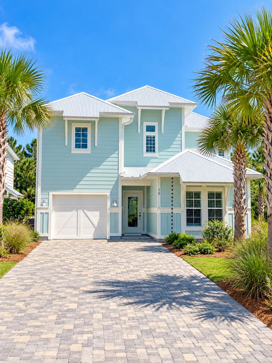 Coastal Perfection!!! This gorgeous Florida Cottage is MOVE-IN READY & MINUTES from 30A! Welcome to 19 Sugar Sands Drive, an elegant 4BR/3.5BA coastal home occupied by the current owner for only approximately 8 months and still feeling practically brand new! OPTIONAL FURNISHINGS are available by negotiation, offering buyers the opportunity for a fully furnished, turnkey home ready for immediate enjoyment. Located south of Hwy 98 with easy access to 30A, beautiful beaches, shopping and dining. This home features marble & quartz countertops, plantation shutters throughout, stainless steel appliances, upgraded lighting and designer finishes throughout. The spacious second-floor primary suite offers a seamless glass shower with designer tile, while a first-floor guest bedroom with private bath provides flexibility for family and guests. Step outside to an incredibly relaxing patio overlooking a private wooded backyard--the perfect place to unwind and enjoy peaceful coastal living. Enjoy beautifully paved community paths, a lake, community pool & clubhouse, and the natural beauty of surrounding preserve lands. Quiet 30A living with the style and convenience of an elegant beach home--without the wait to build! Minimum 6-month rentals; no short-term rentals.