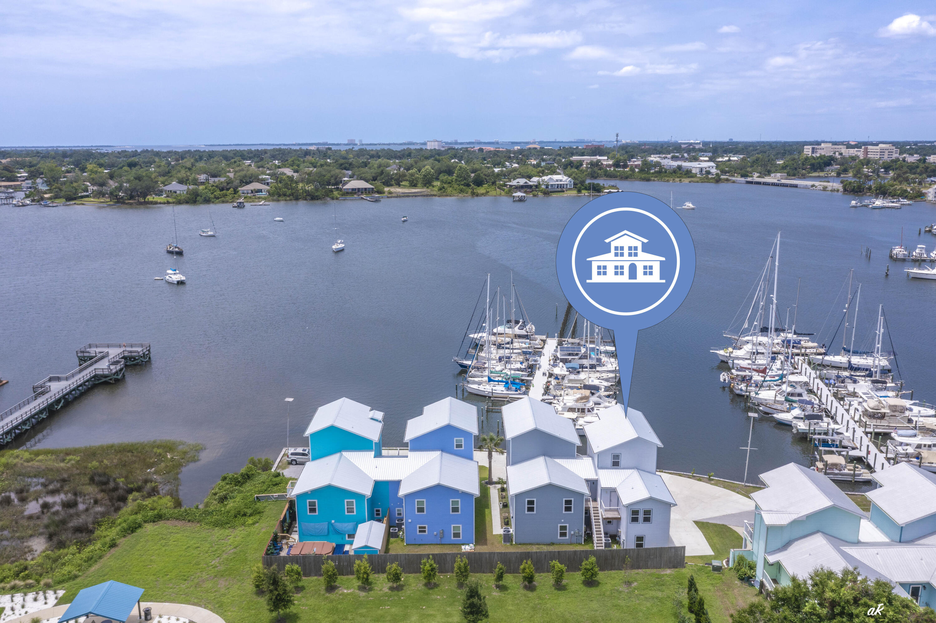 Enjoy breathtaking water views from every floor of this beautifully positioned waterfront townhome. Designed with flexibility in mind, this property offers multiple possibilities for full-time living, vacation use, or income production. The spacious layout can accommodate separate living areas, making it ideal for multi-generational living or maximizing rental potential. An additional top-floor bonus room provides the perfect space for a home office, bunk room, hobby area, or guest accommodations. Whether you're looking for a primary residence, second home, or investment property, this townhome offers the versatility to fit your needs. Short-term rentals are permitted, creating an excellent opportunity for additional income. Located adjacent to the City's newly completed boat launch facility, this property is perfectly situated for boating enthusiasts. There is also the potential to obtain a private boat slip at the neighboring marina, with accommodations for boats up to 35 feet.