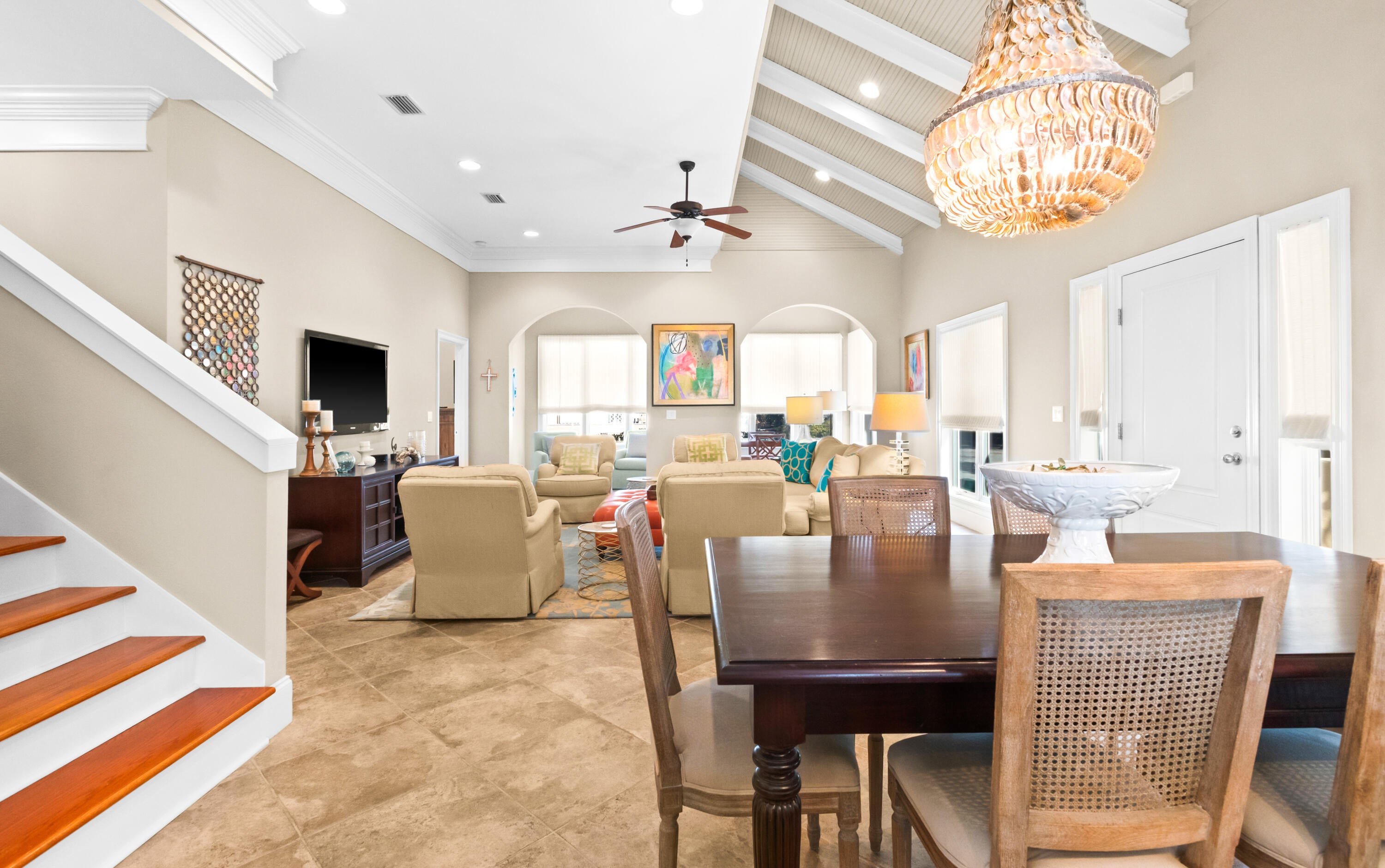 Located in the exclusive Tops'l Beach & Racquet Resort, this furnished 3BR/3.5BA townhouse offers exceptional versatility as a primary residence, second home, or short-term rental investment. The first-floor primary suite provides privacy and convenience, while the spacious 2-car garage with fresh epoxy flooring offers ample room for bikes, beach gear, and organized storage. One of only 22 units in this intimate enclave, owners enjoy a private pool and walkable access to the fitness center and tennis courts. Upstairs features its own living area, creating a separate retreat ideal for family or guests. Tops'l amenities include 600' of beach frontage, a full fitness club, 14 tennis courts, racquetball, pools, steam/sauna, whirlpool, on-site dining and bar, tennis pros, and gated security.