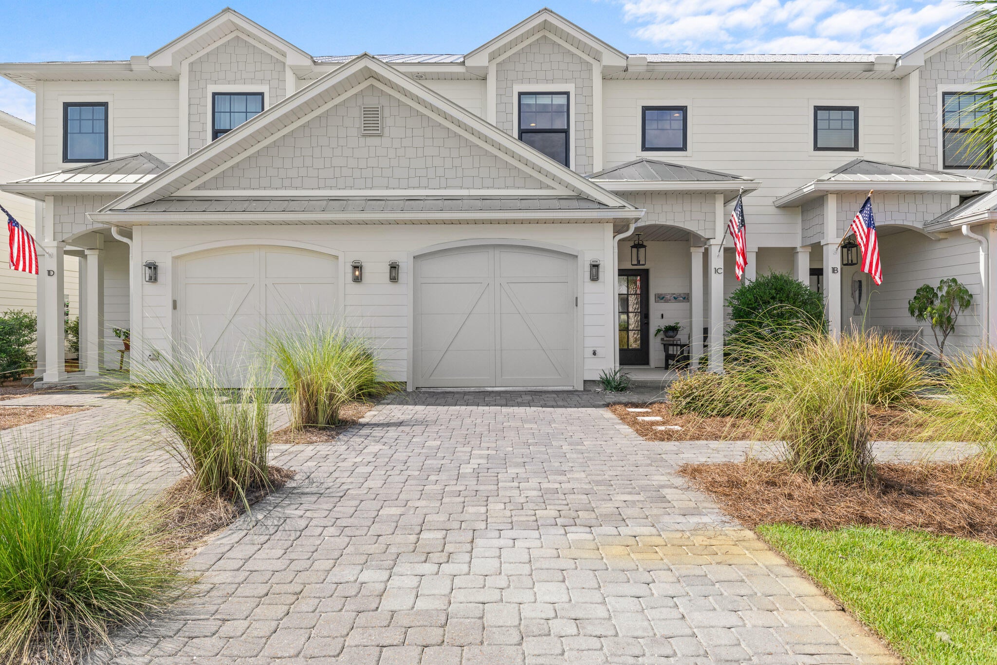A newer-construction 3-bedroom, 2.5-bath home this close to the beach, with green-space views and walkable access to Topsail Hill State Park, is hard to find on 30A, townhome or otherwise. This home offers that mix without the price tag of nearby single-family homes, and far less to manage.
9-foot ceilings, fresh paint, and LVP flooring throughout (tile in upstairs baths). The kitchen anchors the main level: a big island with its own sink, granite counters, white shaker cabinets, tile backsplash, stainless appliances, and a Kitchen Aid dual-oven induction range for anyone who cooks. The open living and dining space looks out through two windows onto the patio and green space, rolling into the Topsail Hill State Park tree line.
Upstairs: a primary suite with a large shower, double-sink vanity, and walk-in closet, two more bedrooms, a full hall bath, and laundry right where you need it. The one-car garage has elevated storage racks and fits a full-size SUV with a paddleboard and gear to spare.
HOA covers the pool, common area upkeep, pine straw, palm trimming, and building maintenance: a true lock-and-leave setup. Most homes on this street already serve as second homes, so you'll be in good company. Non-short-term rental, 12-month leases only. TVs, washer, and dryer convey; other furnishings negotiable. Across 30A, Club 30A is under construction: a fitness facility, event space, and Grindstone Cowboy, all walkable, on top of biking or the tram to the beach. This home is owned by the listing agent, who bought it from the original owners, friends, in 2022, without it ever going to market. So the details below come from firsthand experience, not just a walkthrough.
Welcome to 67 Herons Crossing.
This is a home the seller built their life around, and townhomes here almost never come up for sale. Only one other has ever hit the MLS in this community, and it sold quickly, before it had much time on market. Everything else has changed hands by word of mouth, between neighbors, or off market, the same way this one did in 2022. That tells you something about the people who end up here: once they find it, they don't leave.
The building itself was constructed by a well-regarded local builder rather than one of the larger national production builders that have become common along this stretch of 30A. Nearly seven years in, it shows in the details that matter: tight, straight lines and a home that's held up cleanly, the result of solid original construction and being well cared for since.
Step onto the covered front porch and into an interior unit, quiet and tucked in from the street. Inside, 9-foot ceilings and fresh paint make the whole main level feel bright and current. LVP runs underfoot through the entry, with a coat closet right where you need it and a half bath just off the open living and dining space.
The kitchen is the heart of it. A large island with its own sink anchors the room, topped in granite with white shaker cabinets, tile backsplash, and stainless appliances throughout, including a Kitchen Aid dual-oven induction range for anyone who actually cooks. There's a handy pantry for real storage, not just a closet with cheap wire shelves.
The living and dining space is wide open and unfussy, with two windows pulling in the view: green space rolling back into the tree line of Topsail Hill State Park. No neighbor's fence, no rooftop, just woods. All the Samsung flat-screen TVs and mounts in the home stay with the sale, so you're not starting from scratch.
Upstairs, the primary suite is generously sized, with a bath that includes a large walk-in shower, double-sink vanity, and a walk-in closet with real capacity. The second bedroom is large enough that it currently holds a king bed, two nightstands, and a dresser with room to spare. This isn't a "will it fit" upstairs bedroom; it actually works as a second primary if you need it to. The third bedroom is a comfortable size and currently runs as a home office. The hall bath serves both secondary bedrooms with a tub/shower combo and double-sink vanity, tile carries through both upstairs bathrooms. The laundry with included Maytag washer and dryer is conveniently located upstairs with the bedrooms, not tucked in the garage or a downstairs closet.
The one-car garage is more useful than it sounds. Elevated storage racks keep gear up and out of the way, and there's still room to comfortably park a full-size SUV with a paddleboard and the usual beach-life clutter left over.
Now let's talk about what makes Herons Crossing different.
This is a small neighborhood by design: 12 single-family homes and 8 townhomes, on one street. The townhomes sit in two buildings of four units each, on the south side, with rear patios that open directly onto green space bordering Topsail Hill Preserve State Park. Unlike the single-family homes here, the townhomes carry no conservation easement behind them; the area is genuinely usable space, right up to the tree line.
The HOA takes the maintenance headache off your plate entirely: all common area upkeep, the community pool, annual pine straw renewal, palm tree trimming, yearly pressure washing of the building exteriors, and exterior painting of the buildings as needed. The buildings went up in 2019, and at this point are due for repainting within the next year or two, an additional cost you won't carry personally, since it's handled by the HOA.
Herons Crossing is a non-short-term rental community, 12-month minimum lease term across the board. That means real neighbors and second homes year-round, not a rotating cast of weekly renters. Roughly 70% of homes in Herons Crossing, and 62.5% of the townhomes specifically, are owned as second homes -- a strong sign this is a genuinely low-turnover street, not a transient one.
And then there's the location, which is genuinely hard to find elsewhere on 30A. Topsail Hill Preserve State Park is next door, not a mile away, not a bike trail connection, but bordering the neighborhood directly. While the public beach accesses up and down 30A fill in by mid-morning on a summer weekend, Topsail stays quieter: three miles of protected coastline, towering dunes, and water that looks better than the postcards. Walk or bike to the park entrance and catch the free tram down to the sand or ride your bike straight over. A Florida State Parks annual family pass runs about $120, and that's your beach access sorted for the whole year.
And there's something new on the horizon.
Directly across 30A from the neighborhood, a development called Club 30A is currently under construction; the exterior is mostly completed as of this listing. It's set to include a full-service fitness facility, event space, and a coffee shop and restaurant, Grindstone Cowboy. No official opening date has been announced yet, but it's expected to open within the coming year. For a neighborhood where the closest gym or coffee shop has always meant a drive or a longer bike ride, having walkable fitness and dining land just across the street is a real shift, on top of the walking, biking, and tram access to the beach you already have.
The details that matter:
- 3 bedrooms, 2.5 baths - 1,687 sq ft
- Interior unit - quiet and tucked away from the street
- Built 2019 by a respected local builder, not a national production builder
- Rear patio backs to green space bordering Topsail Hill Preserve State Park
- LVP flooring throughout, tile in the upstairs bathrooms
- 9-foot ceilings, fresh interior paint
- Kitchen: large island with sink, granite counters, white shaker cabinets, tile backsplash, stainless appliances, Kitchen Aid dual-oven induction range, pantry
- Laundry, including Maytag washer and dryer, upstairs with the bedrooms
- One-car garage with elevated storage racks -- fits a full-size SUV plus paddleboards and gear
- All Samsung flat-screen TVs convey
- HOA covers common area maintenance, community pool, pine straw, palm trimming, building pressure washing, and exterior painting as needed
- Non-short-term rental community, 12-month minimum lease
- One of only two Herons Crossing townhomes ever offered on MLS since new
- Club 30A (fitness, event space, Grindstone Cowboy coffee shop/restaurant) under construction directly across 30A
- Walkable, bikeable, or tram access to Topsail Hill State Park beach
- Furnishings are available to purchase outside of closing, with some exceptions