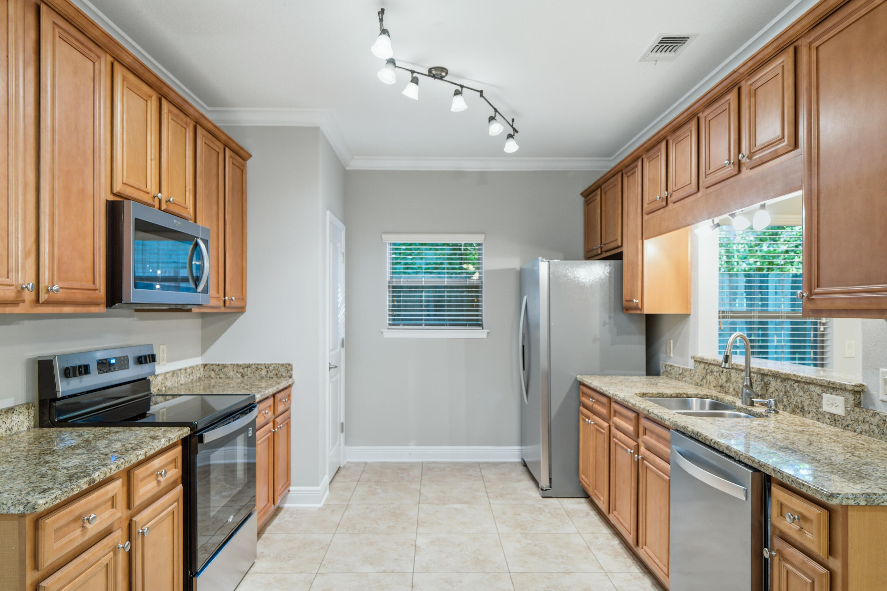 Won't last 100% Move in Ready. New roof and Ac .. 

2009 Built Townhome- 3/2.5 1562 feet! 1 Car Garage! NO HOA! 
This beautiful, move-in-ready end unit townhome is perfectly situated just off Beal Parkway in central Fort Walton Beach--less than 10 minutes from both Eglin AFB and Hurlburt Field! The downstairs boasts a generous open-concept floor plan featuring New Paint, New Flooring, no carpet Upstairs, crown molding, and recessed lighting. The modern kitchen is equipped with granite countertops, a pantry, stainless steel appliances, and a convenient breakfast bar. Just off the dining room, step out to a large open patio and a fully fenced back/side yard perfect for relaxing or entertaining. A handy half bath with a pocket door and direct access to the one-car garage complete the main level. Upstairs, you'll find a spacious primary suite featuring an oversized closet and a private ensuite bath. Two additional bedrooms share a well-appointed hall bath, located just across from the dedicated upstairs laundry room.
