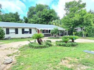 INVESTORS DREAM This beautiful home is in Central Fort Walton Beach, one of the area's most sought-after neighborhoods. It is conveniently located near Eglin and Hurlburt Force bases, making it the perfect choice for those stationed here. With a spacious, versatile floor plan, this home features a separate living area that can easily be converted into an additional bedroom or living room, offering the flexibility to adapt to any family's needs.

In addition to the impressive indoor features, this home also boasts a deep well in the backyard, providing access to fresh water for gardening or other outdoor needs. The 20 x 32 storage shed with electricity is perfect for a workshop or extra storage, while the covered carport provides shelter for vehicles or outdoor equipment. With these features and more, this home is a must-see for anyone looking for a comfortable, convenient lifestyle in Fort Walton Beach. The roof replaced in 2022
Water heater 2011
HVAC around 6yrs. Buyer/buyer's agent to verify all dimensions and any deemed important information. Buyer/buyer's agent to verify all dimensions and any deemed important information.
