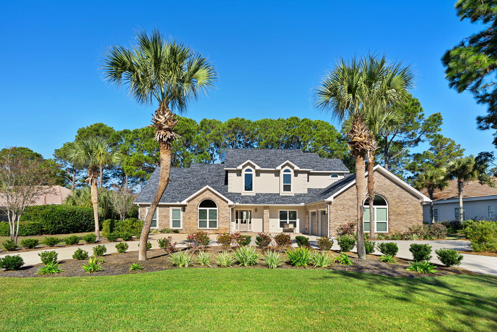 Welcome to 1155 Troon Drive N., a beautiful home nestled in the heart of Sandestin Golf and Beach Resort located in Miramar Beach, FL. This exquisite 3,826 square foot residence offers a blend of elegance and comfort, with backyard views of the Raven golf course.
2025 improvements included a new roof, all new impact windows and glass doors, 2 new hot water heaters, fresh paint throughout the entire interior, and resurfaced ceilings throughout. This home features four bedrooms & four and a half bathrooms, oversized living room, and an enormous family room providing ample space for family and guests. The large main floor primary suite features a sitting area and dual walk-in closets, ensuring plenty of storage. The kitchen has steel appliances, granite countertops, and stone tile backsplash. Enjoy meals in the formal dining room or breakfast room or relax and read a book in the sitting room. Step outside to your private backyard oasis, complete with a private pool, patio, and fenced-in yard. The property also features an oversized attached two garage with additional space to park 3 golf carts. A new circular driveway added in 2024 allows for six additional cars. Don't miss the opportunity to make this exceptional property you next home. Sandestin Golf and Beach Resort offers world-class amenities that include, pristine beach frontage, championship golf courses, tennis courts, a marina, dining, shopping, entertainment at the Village of Baytowne Wharf, and Grand Boulevard. The entire 2400-acre resort is connected by miles of pedestrian, bike, and golf cart paths.