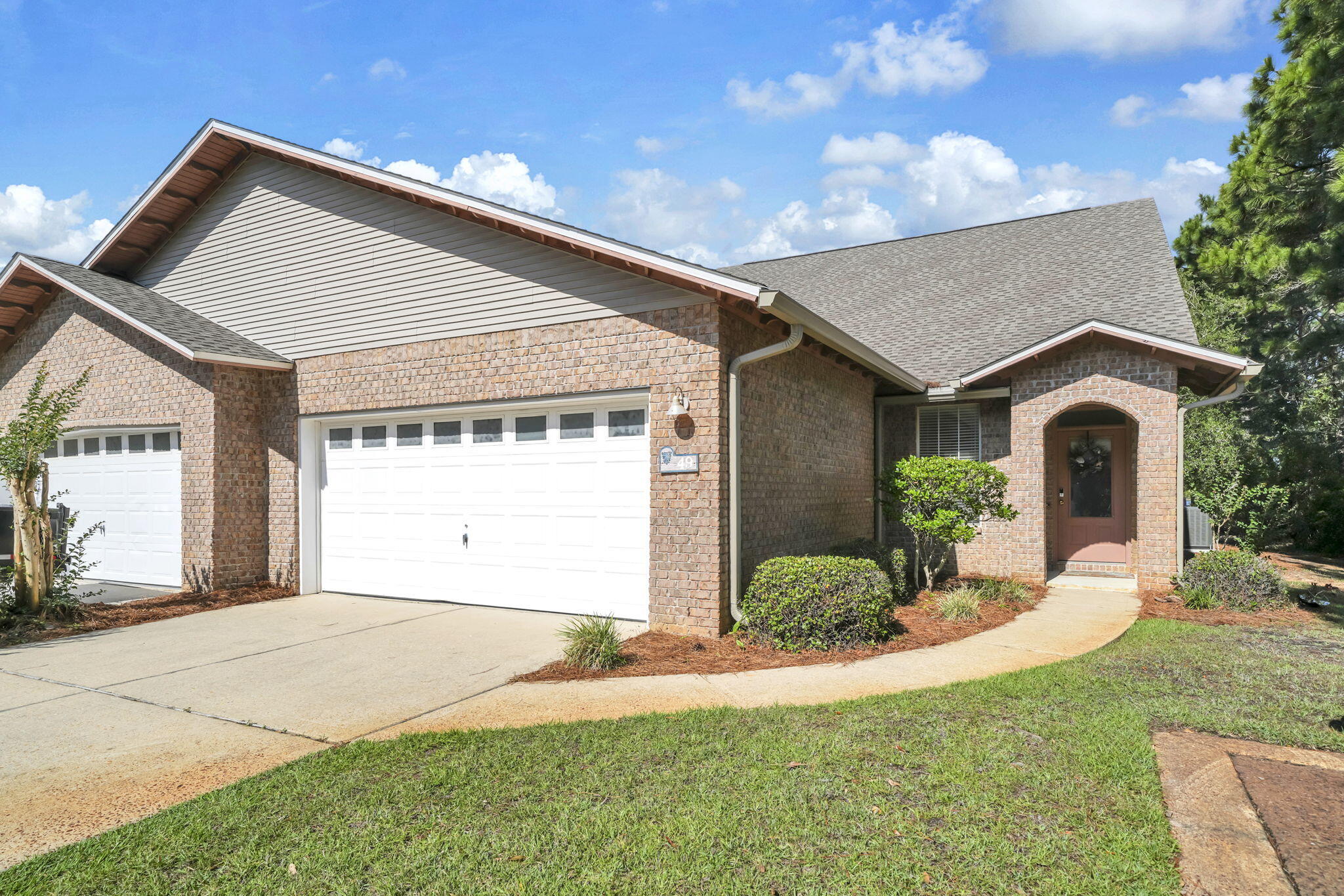 Great end unit situated in a peaceful, friendly community. Bordering a serene lake on the north and a screened-in porch overlooking a pond with fountain perfect for relaxing and entertaining. Spacious floor plan (second largest plan) featuring 2,014 square feet with three bedrooms, two full and one half bath. Includes a versatile bonus room. A two car garage for parking and storage. New HVAC and new carpet Fantastic location convenient to Butler Elementary School (can be accessed via nature/bike/walking trail), restaurants, shopping, attractions, hospital and of course, 30A and the world's most beautiful beaches!  Escada amenities include clubhouse, pool, tennis court, pickle ball and playground.  Townhome HOA dues include lawn service and quarterly interior pest control.  Flood Zone X.