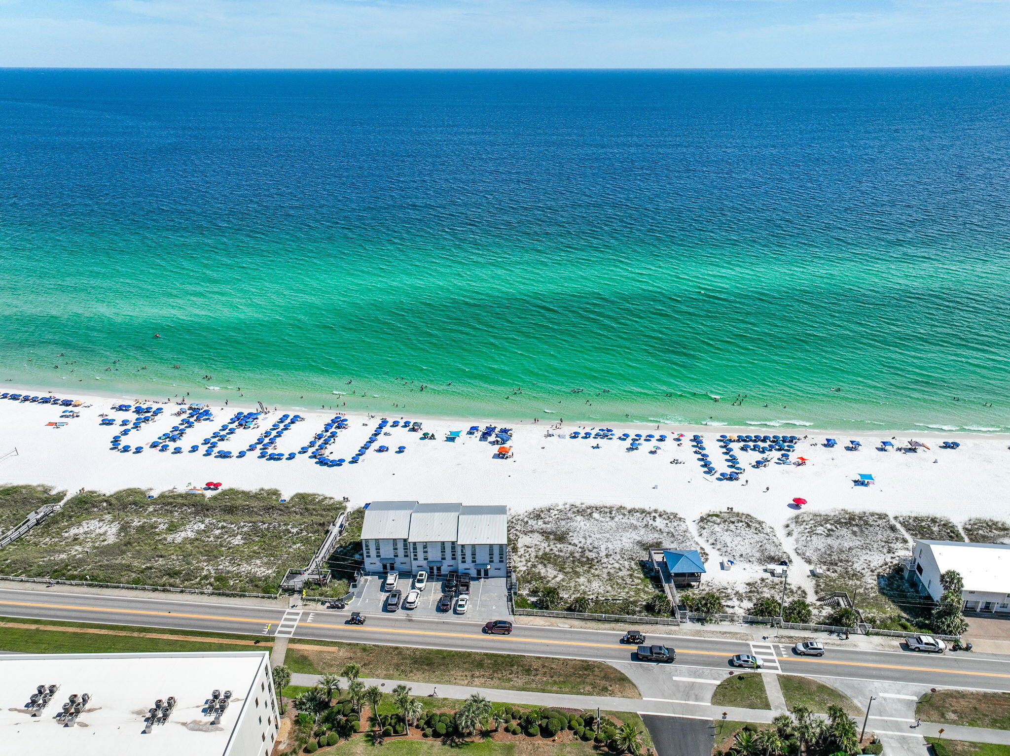 Immaculately Maintained Townhome with Deeded Beach Access in Miramar Beach! Welcome to Gulf Winds East just 150 yards from the sugar-white sands of the Gulf, with deeded beach access and a charming beachfront gazebo. This fully renovated, move-in ready 2-bedroom, 2.5-bath townhome has been lovingly maintained and never used as a vacation rental, ensuring top-notch condition throughout. Step inside to find a massive open-concept living and dining area, perfect for entertaining or relaxing with the family. A custom wet bar adds a touch of luxury, while updated lighting, ceiling fans, and rich, timeless finishes add warmth and style. The rebuilt staircase features custom rod iron railings with floor lighting, and the home boasts knockdown ceilings, crown molding throughout, and updated