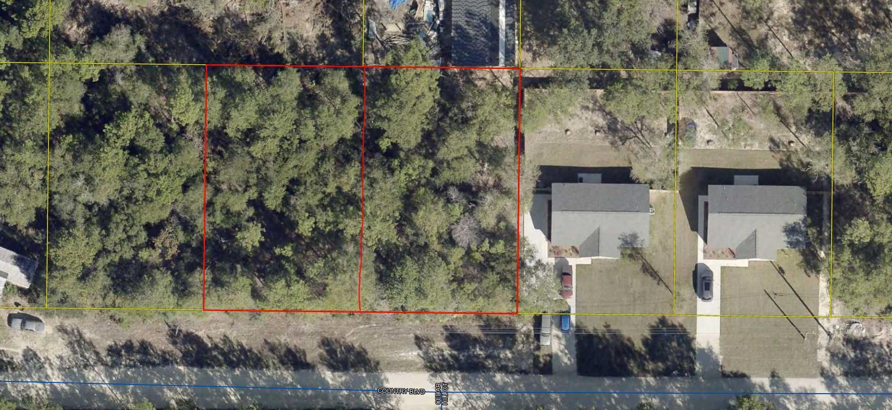 Wooded lot  80'x125' you can almost see Hwy 90 W in DeFuniak.  Located off Girl Scout Road.  
City water available, tap fee not paid.  Several new homes being built in this area.  Mobile homes allowed.  Additional land available at MLS #1001166