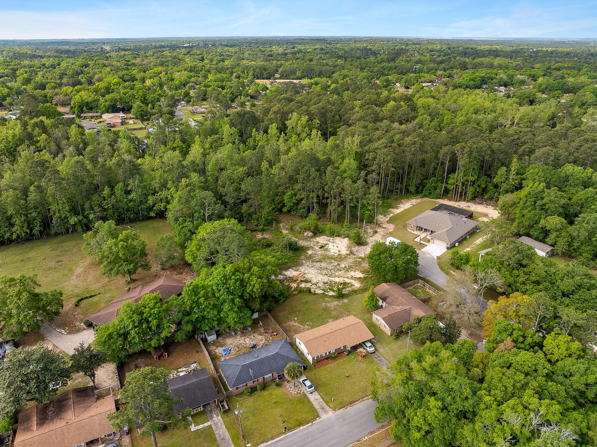 Build your dream home on this beautiful 1-acre parcel located on the 8100 Block of Durand Ave! Offering a peaceful setting with plenty of privacy, this property is ideal for a small home, weekend retreat, or investment opportunity. The front portion of the lot provides usable space for building, while the back half of the property is designated wetlands, creating a natural buffer and added privacy. A regular survey and wetlands survey are already available for buyer convenience. Enjoy the feel of country living while still being within reach of nearby amenities, shopping, and dining. Bring your builder and start planning your future today!