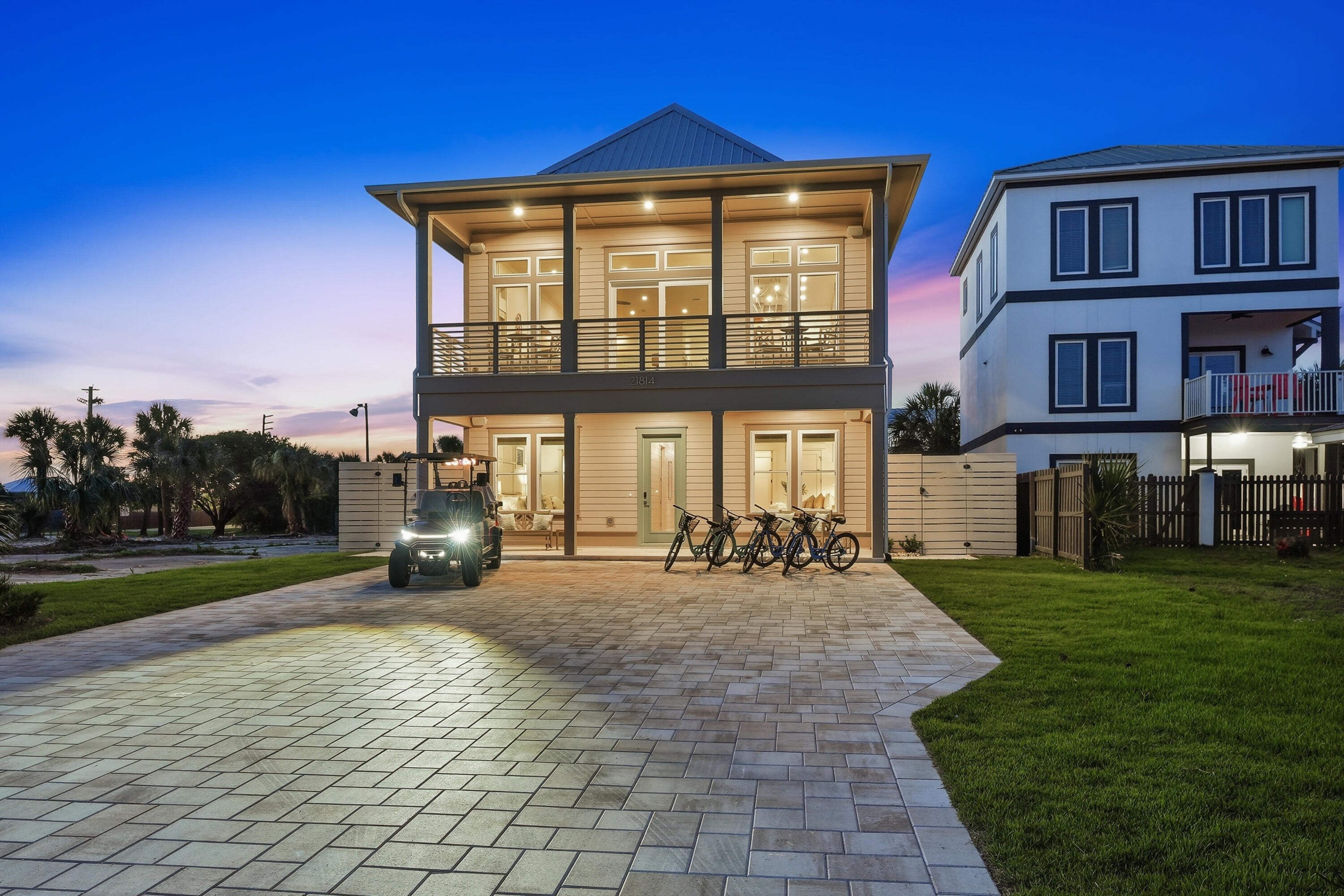 Experience the ultimate in luxury coastal living with this newly constructed beach retreat on the highly desirable West End of Panama City Beach. Offering 3,302 square feet of thoughtfully designed living space, this exceptional home features 6 spacious bedrooms, each with its own private ensuite bath, creating the perfect setup for large families, vacation guests, or premium rental opportunities. Designed to comfortably accommodate up to 16 guests, the home showcases an expansive open-concept great room ideal for entertaining, along with a separate recreation room conveniently located near the pool area. Two laundry rooms provide added convenience for larger groups and extended stays. Perfectly positioned for enjoying the Gulf Coast lifestyle, this property offers beautiful Gulf views and beach access located just across the street, with two public access points only a short walk away. The outdoor living experience is equally impressive, featuring a large private pool with a sun shelf that can also function as a spa, a covered pavilion, and a fully equipped outdoor kitchen designed for entertaining. The backyard oasis is enhanced with lush artificial turf, generous green space, and an integrated Sonos sound system throughout the pool area, balconies, and main living spaces. Additional highlights include parking for up to six vehicles and a fully furnished interior professionally designed with refined coastal elegance. Whether you are seeking a primary residence, second home,