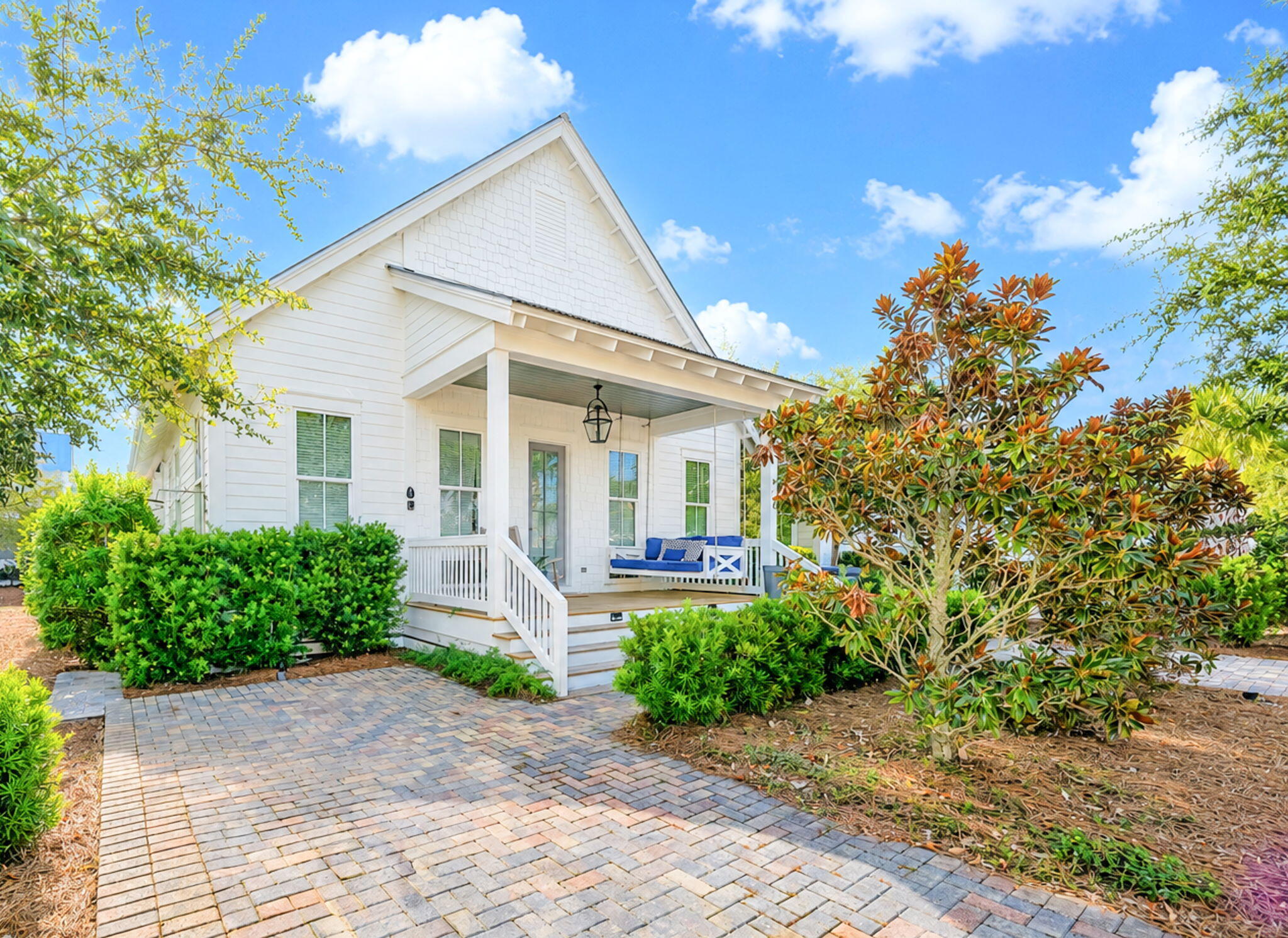 The ultimate family retreat in the exclusive, private, gated community of Cypress Dunes on the west end of Scenic Highway 30A!

Nestled in a quiet and secluded neighborhood in Santa Rosa Beach, this beautiful coastal cottage offers the perfect blend of relaxation, comfort, and resort-style amenities, all just one mile from the sugar-white sands and emerald waters of the Gulf.
This charming, single-story home features an open-concept floor plan designed for gathering with family and friends. Offering 3 bedrooms and 2.5 bathrooms, the home comfortably accommodates guests with two spacious king bedrooms and a bunk room featuring two twin-over-full bunk beds.

The fully equipped kitchen is a chef's dream, featuring stainless steel appliances, a gas range, a reverse osmosis water purification system, a wine refrigerator, and a large island with seating for four.
The spacious primary suite offers a king bed, Smart TV, a large walk-in closet with custom shelving, and a luxurious en-suite bath complete with double vanities, a large walk-in shower, a soaking tub, and a private water closet. The guest suite also features a king bed and Smart TV, while the bunk room is perfect for children and additional guests.
Outdoor living is just as inviting. Relax on the welcoming front porch with its custom swing, or unwind on the private screened-in back porch featuring privacy curtains, a large Smart TV, a dining table for 4, additional seating for entertaining, and a propane gas grill. Cypress Dunes is one of 30A's most desirable communities, offering exceptional amenities, including two community pools, a heated spa, and a breathtaking infinity-edge pool overlooking the Gulf of America. Residents and guests also enjoy tennis and pickleball courts, a fitness center, an outdoor fireplace, and scenic walking trails with elevated boardwalks that wind through beautiful 200-year-old cypress ponds.

Even better, the Phase Il community pool is located directly across the street, and 30A's newest beach access is just a mile away.
Whether you're looking for a primary residence, second home, or vacation retreat, this exceptional coastal cottage offers the very best of the 30A lifestyle.