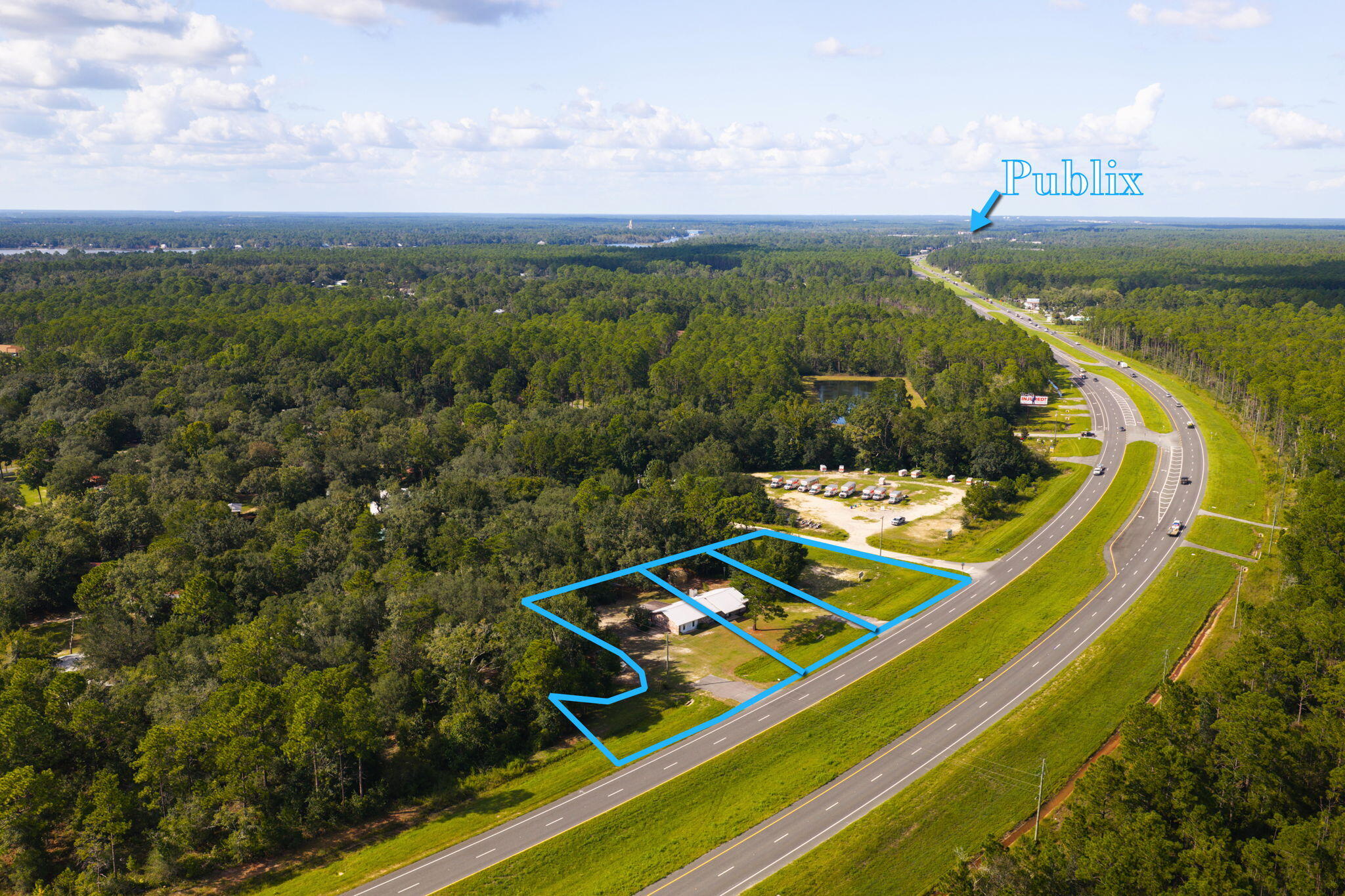**INVESTORS & DEVELOPERS--OPPORTUNITY ON US HWY 331\!** Positioned along the rapidly growing US 331 corridor in Freeport, this property is located on a canal and offers over 400 feet of road frontage, excellent visibility, public water and sewer availability, and outstanding potential for commercial use\.

Current **Rural Village zoning** allows for a variety of potential business uses, including professional and medical offices, restaurants, retail, lodging and more\. **General Commercial zoning may also be an option**, subject to applicable Walton County approvals\.

The property consists of **three full lots** and includes an existing **2,207\-square\-foot, 3\-bedroom/2\-bath brick home**, providing an excellent opportunity for conversion to professional office space or another permitted use\. The interior features a spacious kitchen, large flex space, updated bathrooms, tile and laminate flooring, and a wood\-burning fireplace with convenient exterior loading access\.

A **300\-foot well and septic system** are currently in place, while the availability of public water and sewer adds flexibility for future redevelopment\.

With canal frontage, over 400 feet of road frontage along **US Hwy 331**, multiple lots, an existing structure and versatile zoning potential, this is a unique opportunity in one of Northwest Florida's rapidly growing areas\. Buyer to verify zoning, allowable uses, utilities and development potential with Walton County and applicable utility providers.