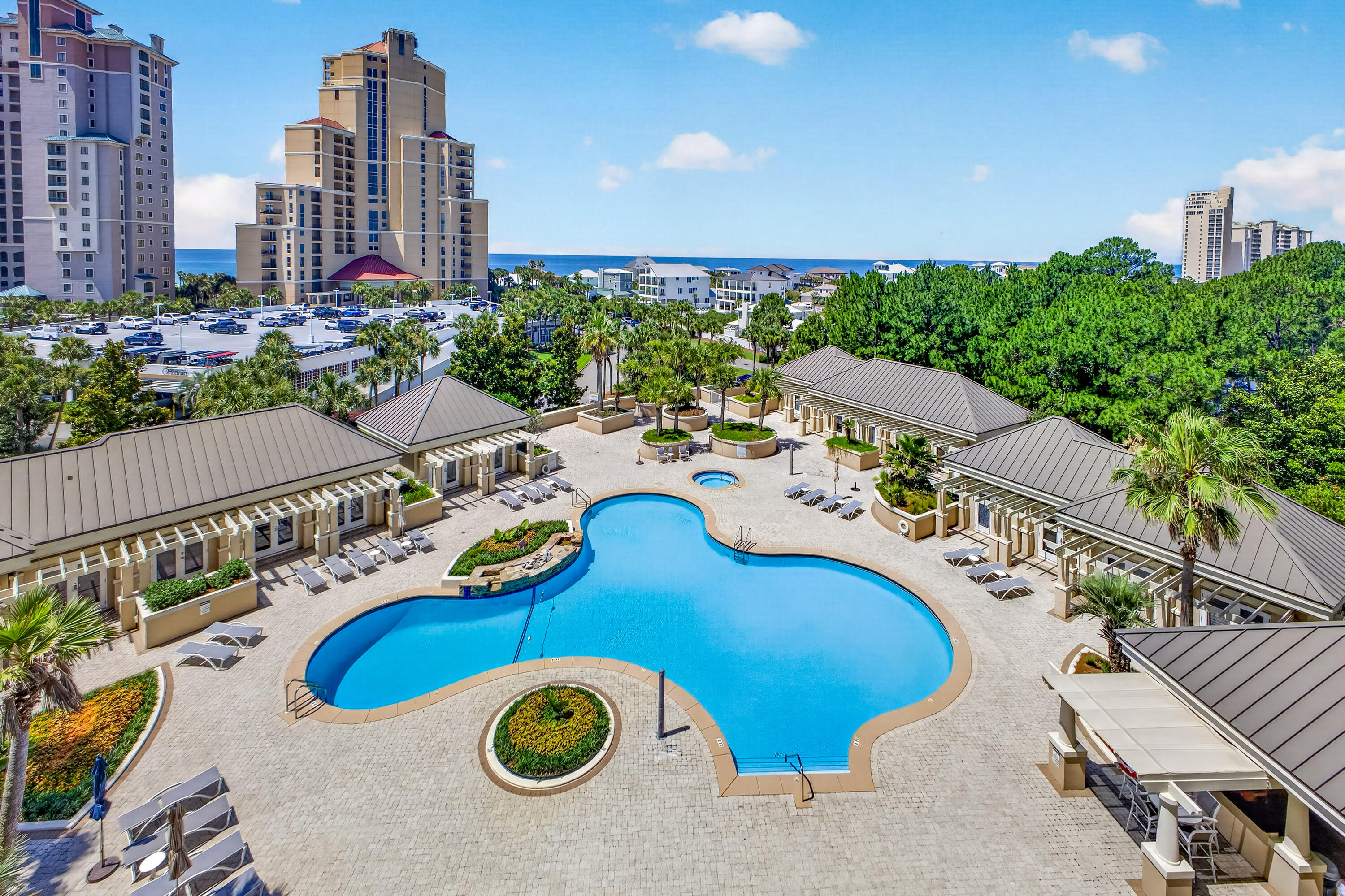 Pristine, one-owner condominium in Sandestin's premier non-rental beachfront building, offered fully furnished and complete with deeded covered garage parking space #81. Never before sold and meticulously maintained, this immaculate sixth-floor residence showcases breathtaking views in every direction--from the emerald waters and spectacular sunsets of the Gulf to the fireworks and vibrant atmosphere of The Village of Baytowne Wharf. Designed for comfortable coastal living, the spacious kitchen features granite countertops, double ovens, and a breakfast bar that opens seamlessly to the great room. Floor-to-ceiling windows and sliding glass doors fill the home with natural light while framing beautiful views of the lagoon-style pool and Gulf from the expansive south-facing terrace. The Gulf-facing primary suite offers direct terrace access, a walk-in closet, linen closet, and a private en-suite bath. Two guest bedrooms open to a north-facing balcony overlooking the resort, lake, marina, and bay. This exceptional residence combines luxury, comfort, and unmatched views in one of Sandestin's most sought-after residential communities. Private building amenities exclusive to One Beach Club Drive include a tennis/pickleball court, a large lagoon-style pool surrounded by private heated and cooled cabanas, an outdoor kitchen, two guest suites, a media room, a social/game room with catering kitchen, a well-equipped fitness center, and more. Each unit transfers with a membership in the private Beach Club which is adjacent to the property*(fees apply).
As an introduction to the Sandestin lifestyle, we invite our new owners to explore amenities that make Sandestin special. The listing brokerage and seller(s) are presenting the buyer(s) of this property with (2) 90-minute rounds of Tennis court time, a golf foursome at one of our three championship courses, and a round of golf for up to four (4) players at the unrivaled Burnt Pine Golf Club.