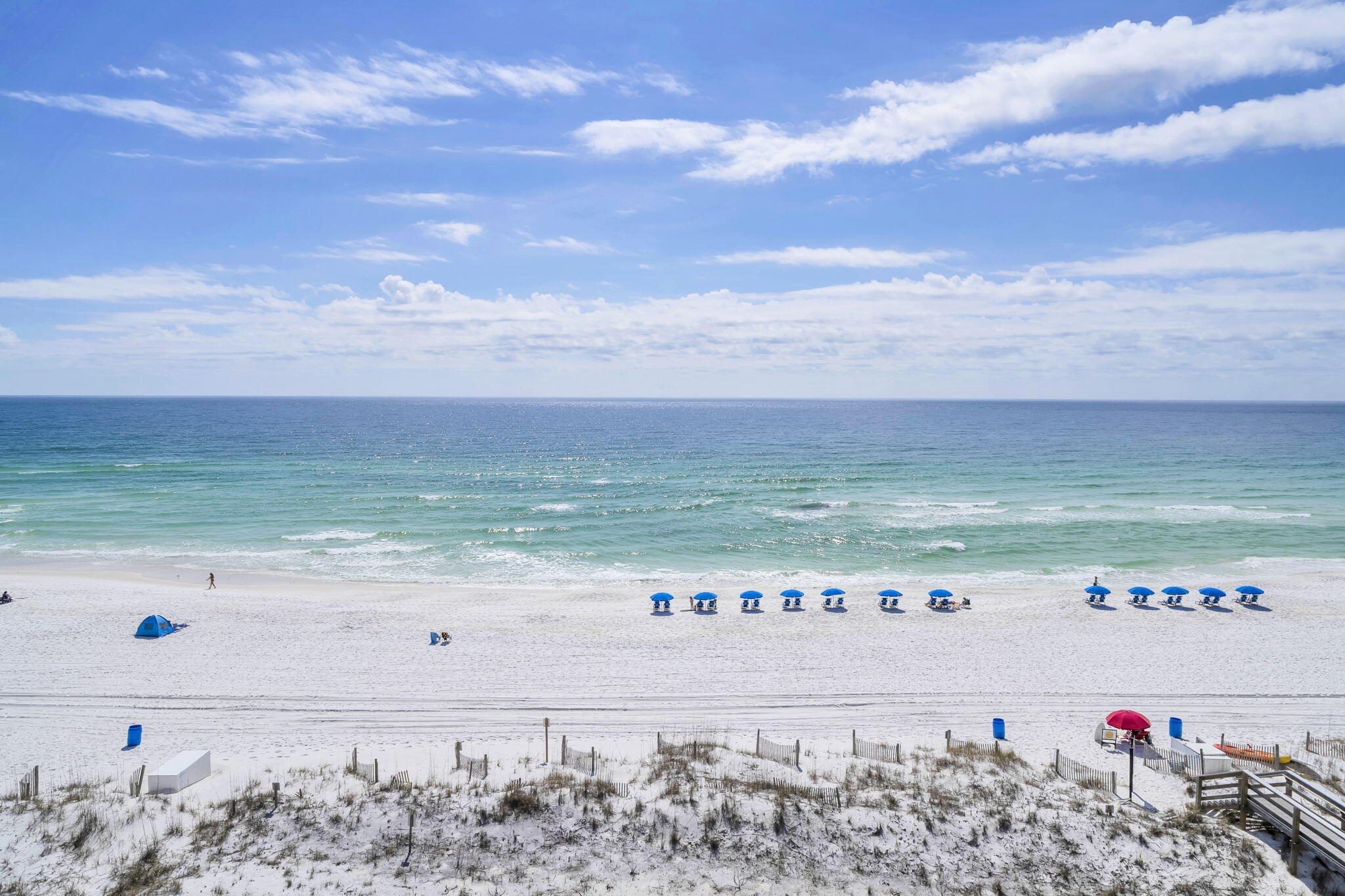 NEW PRICE!  Now offered at $995,000, this spectacular Gulf-front penthouse at The Palms offers an exceptional opportunity to own in one of Okaloosa Island's most intimate beachfront communities.  With only 23 residences, The Palms provides a peaceful, boutique Gulf-front lifestyle where ownership opportunities don't come along often.  Wake up feeling like you're on your own private island as sweeping, unobstructed views of the Gulf of Mexico become the centerpiece of everyday living.  Natural light pours through the home's windows and glass doors, leading to a private Gulf-front balcony where the sound of the waves becomes part of everyday life.  The primary suite enjoys the same breathtaking waterfront setting, allowing you to begin each day with a Gulf sunrise and end it with spectacular sunsets.  Beautifully updated throughout, the residence features a new HVAC system, new water heater, quartz countertops, updated cabinetry, new appliances, new flooring, and new windows and doors.  The renovated primary bath includes. new tub and shower.  Offered fully furnished, this penthouse is truly move-in ready and equally suited as a. primary residence, second home, or luxury vacation retreat.  Short-term rentals are permitted, making this an outstanding opportunity for luxury vacation home, second home, or income-producing beachfront investment.  Major building improvements - including new windows, doors, balcony upgrades, and a new roof - have already been completed and paid for, providing exceptional value and added peace of mind for the next owner.