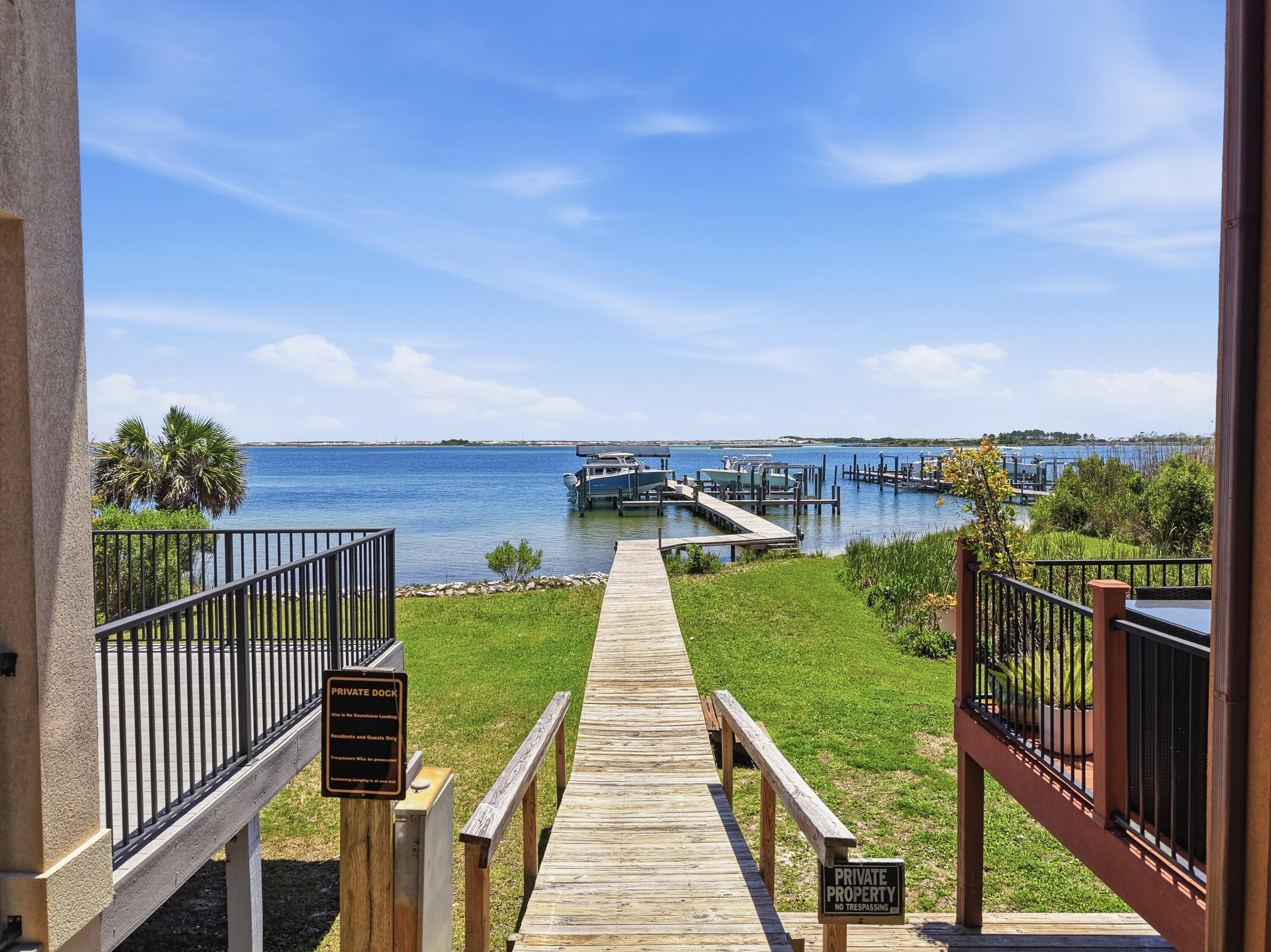 Experience coastal living in this beautiful 3-bedroom, 2.5-bath home located in the highly desirable waterfront community of Soundview Landing. This property includes your very own private boat slip complete with a boat lift (maximum boat length 26'), offering easy access to the water and just minutes from Crab Island by boat!

This Mediterranean-style home showcases custom kitchen cabinetry, granite countertops, a pantry, stainless steel appliances, and a spacious breakfast bar perfect for morning coffee or casual dining. Step outside to the back deck and enjoy peaceful views overlooking a natural conservation area -- the perfect setting to relax and unwind.

The primary suite is conveniently located at the back of the house on the first floor, while two additional bedrooms and a full bathroom are upstairs. All bedrooms and all of the upstairs is fully carpeted whist the downstairs features LVP flooring. The spacious primary bathroom features a double vanity, separate soaking tub and walk in shower, along with a walk-in closet designed for comfort and convenience.

Residents also enjoy access to the community's private waterfront dock. Conveniently located just minutes from Hurlburt Field and within close proximity to Eglin Air Force Base, this home also offers easy access to top-rated schools, shopping, dining, entertainment, and the stunning Gulf Coast beaches. Contact us today for a showing!