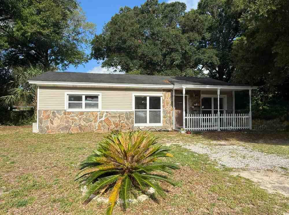 Spacious 3-bedroom, 2-bath home offering approximately 1,838 square feet on a generously sized corner lot in Fort Walton Beach. This slab-built home has already seen substantial improvements and offers a great combination of functional updates, flexible living space, and opportunity for additional cosmetic improvements. The interior features an updated kitchen with wood cabinetry, granite countertops, stainless steel appliances, ample storage, and an open connection to the dining and living areas. One of the home's standout features is the large heated and cooled sunroom addition, providing significant additional living space that could serve as a second living area, game room, entertaining space, home office, or flex room.Major improvements include an approximately 7-year-old roof, a new water heater installed this year, a new RainSoft water treatment system, and termite treatment with an existing termite bond. Seller reports extensive updates were completed in 2019 and the property successfully passed inspections at that time. Central HVAC is in place; buyers are encouraged to independently verify system age and condition.The home is currently functional and livable while leaving room for additional value through relatively straightforward cosmetic improvements, including interior paint, select flooring replacement, bathroom refreshing, exterior cleaning, and rear-yard landscaping.Outside, the property offers a large corner setting with mature shade trees, expansive yard sp