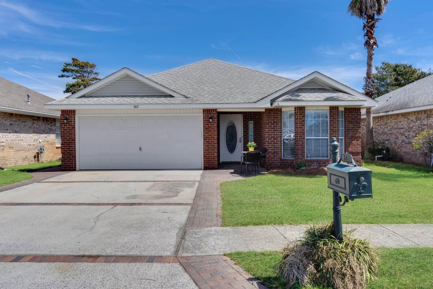 Coastal Living in Paradise Retreat!!
Welcome to this beautifully maintained 3-bedroom, 2-bath all-brick home in the sought-after gated community of Paradise Retreat. Ideally positioned with convenient access from Scenic Gulf Drive on the beach side and Highway 98 to the north, this home places you minutes from the beach, dining, shopping, and local entertainment. Inside, a bright, open floor plan creates an inviting setting for everyday living and entertaining. The recently updated kitchen features granite countertops, a tile backsplash, farmhouse sink, stainless-steel appliances, and a seamless flow into the living room, dining area, and an additional informal sitting space. The desirable split-bedroom layout provides privacy for the primary suite, located on the opposite side of the home from the guest bedrooms. The primary bath includes a separate garden tub, and the suite offers a generous walk-in closet. Outside, enjoy a spacious backyard with ample room to add a pool, plus an inviting paver patio designed for outdoor dining, relaxing, and gathering with family and friends. Approximately 320 feet of deeded beach access is just a short walk away. Whether envisioned as a primary residence, comfortable second home, or short-term rental opportunity, this property offers exceptional flexibility in one of the area's most desirable beachside communities. Estimated short-term rental potential is reported at up to $80,000 annually; buyer should independently verify rental projections and local regulations. Major upgrades include a tankless gas water heater (2018), new dishwasher (2022), new HVAC system (2025), freshly painted interior, a new irrigation pump, metal hurricane shutters, and a new roof (2026). A two-car garage adds everyday convenience and storage.
