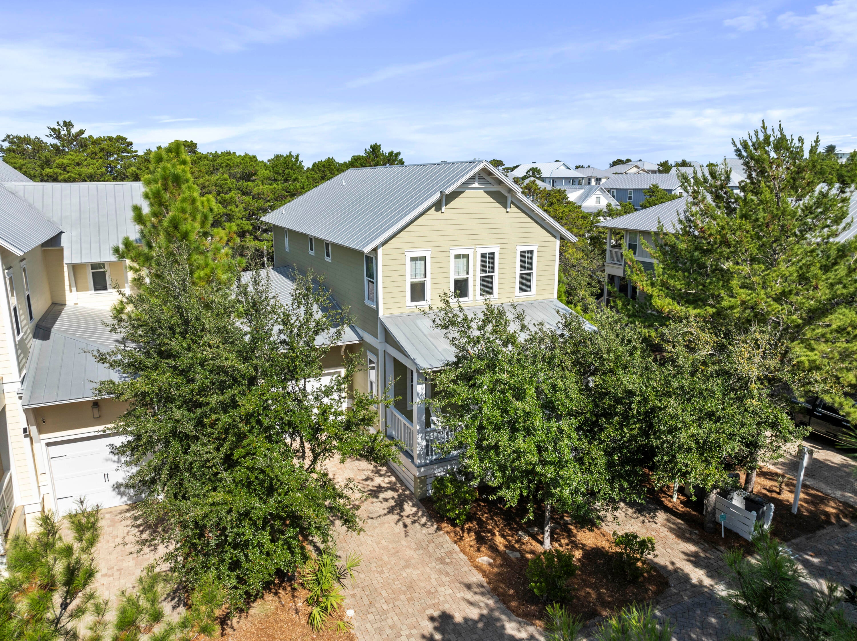 Nestled in the highly sought-after Highland Parks community in Blue Mountain Beach along Scenic 30A, this stunning 4-bedroom, 4.5-bath home offers the perfect blend of comfort, style, and coastal charm. Designed with an abundance of natural light, the home features large windows that fill the open-concept living space with warmth and brightness. Offered as a furnished rental, the thoughtfully designed floor plan includes two spacious primary suites--one conveniently located on the first floor and another on the second--providing flexibility and privacy. The main living area flows seamlessly to a generous rear porch, perfect for relaxing or entertaining guests.

Upstairs, you'll find two additional bedrooms, a versatile bunk room ideal for guests or rental flexibility, and the second primary suite, offering ample space for family and visitors. Enjoy peaceful views of the green space directly behind the home, complete with a walking path that leads to the neighborhood's resort-style pool and amenities.

Available as a 6-12 month lease, this property captures the essence of 30A living with its prime location, functional layout, and inviting indoor-outdoor lifestyle.