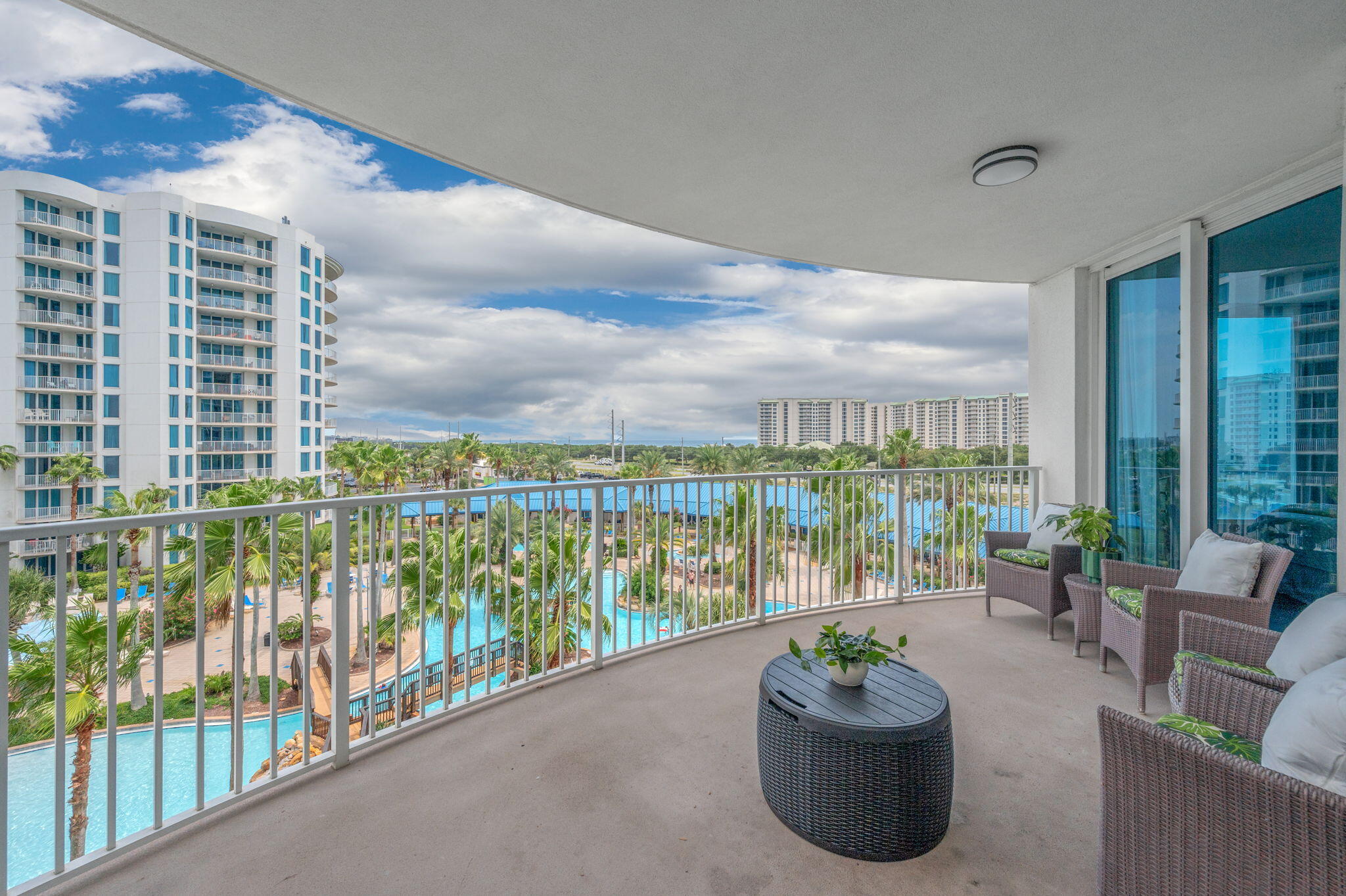 Welcome to one of the most coveted stacks at The Palms of Destin! Unit 2515 is a beautifully positioned 5th-floor, fully furnished 2-bedroom, 2-bath coastal retreat offering something truly special--panoramic Gulf views from every room and a front-row view overlooking The Palms' spectacular zero-entry, lagoon-style pool. Step inside and you'll immediately understand why the 15 stack is so highly sought after.

Whether you're searching for a vacation home, income-producing short-term rental, long-term investment, or your own coastal escape, this turnkey condo offers an incredible opportunity in the heart of Destin. The spacious open layout is designed for relaxed coastal living, while the furnishings make it ready to enjoy or rent from day one.

And then there's the pool! The sprawling zero-entry lagoon-style pool is truly what vacation dreams are made of, complete with five dancing waterfalls, walking bridges, a splash pad, hot tub, and expansive pool deck. It's a paradise for families, with plenty to keep the kids entertained while adults relax and soak up the Florida sunshine. The amenities at The Palms extend well beyond the pool. Residents and guests enjoy a state-of-the-art fitness center, indoor pickleball and basketball courts, two lighted tennis courts, a fully fenced children's playground, sports lounge, and complimentary seasonal beach shuttle to public Gulf beach access. Grab a coffee in the morning or enjoy food and refreshments at the on-site bistro, restaurant, and outdoor bar--you may find there's little reason to leave!

Just minutes from Destin's famous sugar-white sand beaches and surrounded by some of the area's best dining, shopping, and entertainment, the location is hard to beat. Walk to popular destinations including Joe's Crab Shack, Bubba Gump Shrimp, The Back Porch, Ruth's Chris Steak House, and Fudpuckers. Destin Commons, with more than 75 shops, restaurants and an AMC theater, as well as Bass Pro Shop and HarborWalk Village, are just a short drive away. Henderson Beach State Park, featuring 6,000 feet of pristine Gulf-front shoreline, is also nearby.

The HOA fee includes electricity, water, cable TV, high-speed Wi-Fi, and access to the impressive collection of on-site amenities, adding tremendous convenience for both owners and rental guests.
With its highly desirable 15 stack location, unobstructed Gulf views, incredible pool views, full furnishings, resort-style amenities, and prime Destin location, Unit 2515 is an exceptional opportunity to own a piece of the Emerald Coast at The Palms of Destin. Come see for yourself why this is one of the building's most coveted locations!