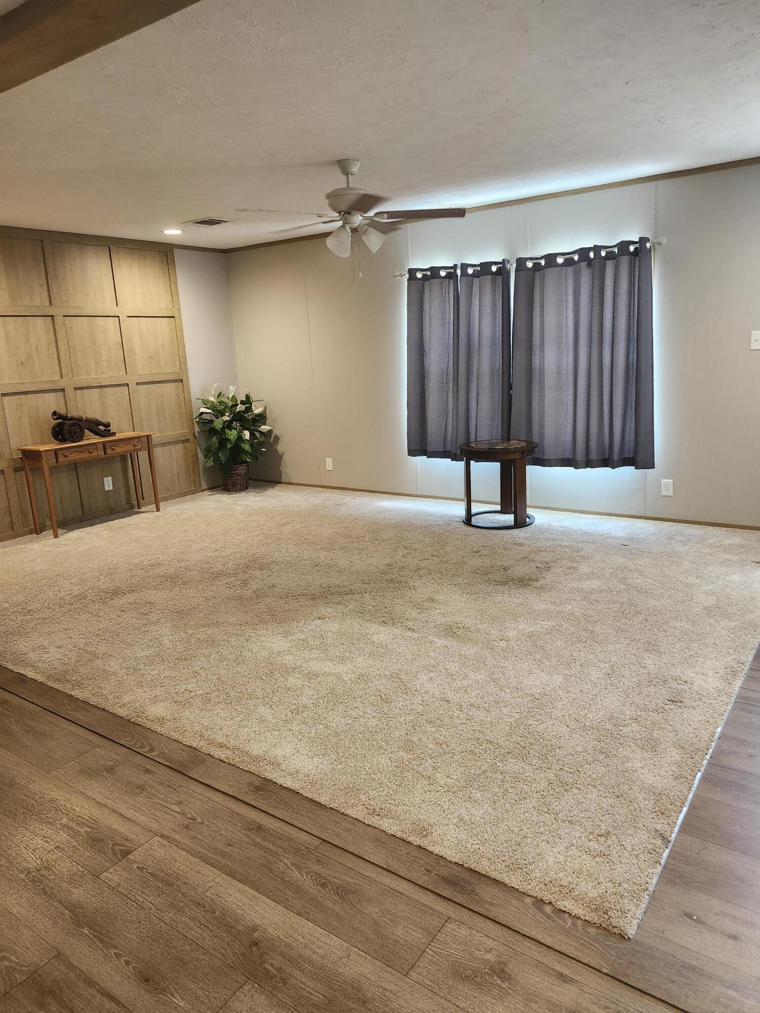 This Move-IN-Ready 3/2 features a great room with an open floor plan where the family can all be together. This home offers a perfect blend of comfort and charm with plenty of indoor and outdoor space. 
Large wooden decks on both the front and back of the home with an additional wheelchair ramp, a fenced backyard, and pretty grass, this home is ready to go. Washer & Dryer can convey with sale but have no value if the buyer wants them.    
This property provides an inviting outdoor oasis where you can easily entertain friends and family, while 4 dedicated parking spaces ensure convenience for all. This private back yard  has a huge deck perfect for BBQ's and summer fun. The master bedroom has an amazing ensuite with double vanity sinks with an off the floor cabinet, and 2 walk in closets in the room.  The shower has a low entry threshold for handicapped accessible chairs.  Built in 2022 Roof, hot water heater, electrical, & HVAC are inspection ready!! This home has been professionally cleaned and is waiting to be a home again.