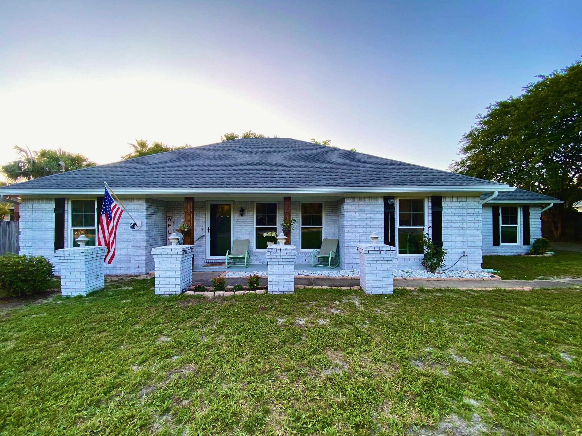 Welcome home to this beautifully remodeled brick residence located in a peaceful neighborhood with private beach access to the Santa Rosa Sound. Offering the perfect combination of comfort, space, and convenience, this home is ideally situated with easy access to military bases, schools, shopping, dining, and local attractions.

Step inside to discover a spacious 3-bedroom, 2-bathroom floor plan designed for comfortable living. The impressive primary suite serves as a private retreat, featuring oversized closets, a separate water closet, dual vanities, a relaxing whirlpool tub, and a separate shower.

Two generously sized guest bedrooms share a full bathroom, providing plenty of space for family members or guests.

The well-appointed kitchen offers a cozy breakfast nook for casual dining, along with a breakfast bar that provides additional seating and entertaining space. For more formal occasions, enjoy the separate dining room, perfect for hosting family dinners and holiday gatherings.

The inviting living room features a decorative stone fireplace and direct access to the backyard, creating a warm and welcoming atmosphere for relaxing or entertaining.

Outdoor enthusiasts will appreciate the ample parking space available for a boat or RV, making it easy to enjoy all the recreational opportunities the area has to offer.

Pet-friendly on a case-by-case basis with owner approval and a non-refundable pet fee.

No smoking permitted, including vaping. This exceptional property combines coastal living, modern updates, and plenty of space both inside and out. Don't miss the opportunity to make this beautiful home your next residence!