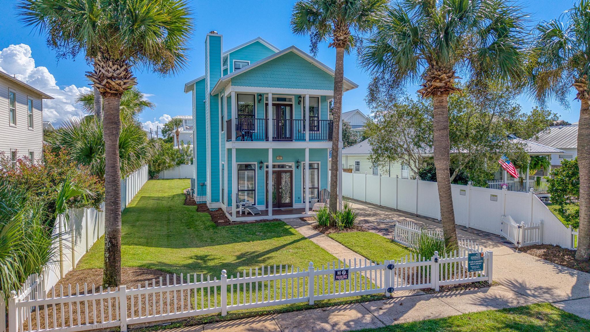 Luxury coastal living feels right at home in this meticulously maintained, beautifully remodeled retreat in Crystal Beach, one of Destin's most desirable beachside communities. Just a short stroll from the beach, this property pairs inviting interiors with private outdoor space, a detached garage, and no HOA. Whether you're seeking a personal residence, an investment property, or a beach getaway with income potential, this location offers an appealing blend of lifestyle and opportunity.

Palm trees and picket fencing create a welcoming first impression. Inside, an open floor plan connects the living and dining areas with a thoughtfully appointed kitchen featuring granite countertops, beautiful cabinetry, stainless-steel appliances, and a tile backsplash. Travertine flooring, smooth ceilings, and crown molding lend a polished finish to the main level, while a fireplace, plantation shutters, and leaded-glass doors add warmth and character. A combined laundry room and bathroom provides everyday convenience.

Upstairs, two spacious primary bedrooms feature hardwood floors and private balconies, offering quiet places to enjoy the coastal breeze. A third-floor loft provides flexible space for guests, a second lounge, or a restful retreat after a day at the beach.

The fenced backyard offers space to gather, unwind, and explore the possibility of adding a pool. A detached garage adds valuable storage and parking. Beautifully cared for and thoughtfully updated, this Crystal Beach home brings together comfort, character, and the freedom of ownership without an HOA, all just a short walk from Destin's sugar-white sand and emerald waters. Paint inside and outside in the last 3 years, NEW ROOF 2026, NEW HVAC 2026.