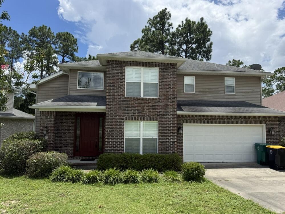 This 4 bedroom, 3 bath home has a screened in back porch with additional outdoor deck, bedroom and full bath downstairs. The kitchen opens to the living room, dining area and formal dining room. The living room has a beautiful gas fireplace. The master suite is located upstairs with a garden tub, with separate vanities. The other two bedrooms have a jack and Jill bathroom. Also has a large bonus air-conditioned space that could be used for storage or potential play area for little ones. NEW CARPET