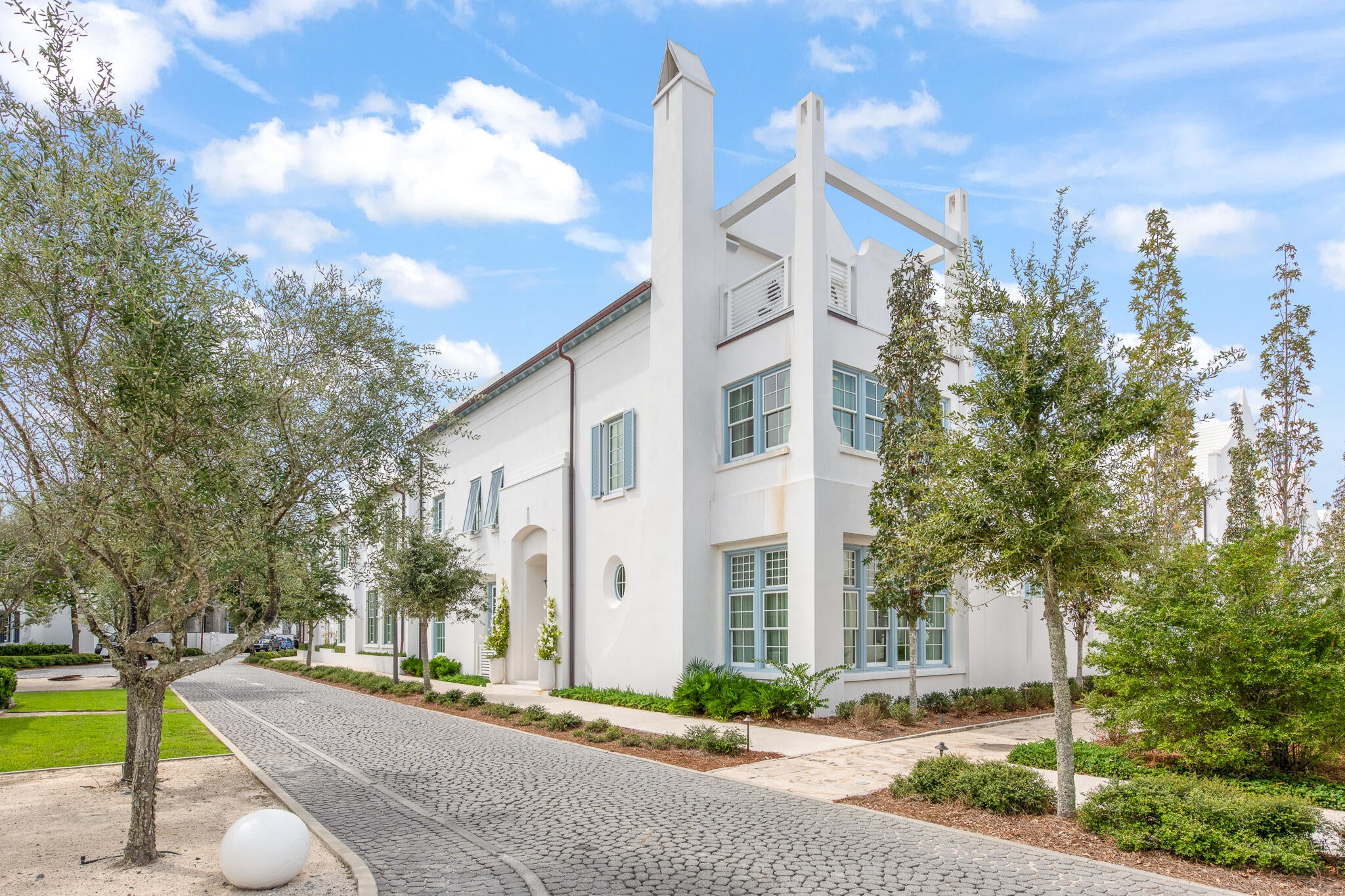 Welcome to 195 N. Charles Street, where elegance meets exquisite design in the heart of Alys Beach. Crafted by the renowned Christ & Associates Architecture, this stunning residence overlooks the picturesque Papilio Park, featuring a mature Olive Grove and a serene sitting fountain to enjoy.

Spanning 4,415 sq. ft. of luxurious living space, complemented by an additional 1,133 sq. ft. of terraces and loggias, this home is a true masterpiece. As you approach, you'll be captivated by its beautiful setting, anchored by Papilio Park and a charming northern pedestrian path.

Step inside to the grand foyer, adorned with architectural ceilings that set the tone for the rest of the home. To the right, you'll find a spacious living room, and to the left, an elegant dining room, both furnished with professionally designed decor and custom window treatments.

The gourmet kitchen is a chef's dream, featuring a 48-inch Wolf range beneath a Venetian plaster hood, accented by a solid slab marble backsplash and countertops. Adjacent to the kitchen, a cozy media room and bar area, complete with antique glass, icemaker, and beverage refrigerator, provide the perfect space for relaxation and entertainment.

The 1st floor primary suite is designed for ultimate comfort, overlooking the home's tranquil courtyard and swimming pool. This oasis boasts his and her closets, as well as separate water closets. The spa-like bathroom features luxurious marble and exquisite tilework, a bubbling tub, and a and a spacious steam shower.

On the second floor, discover three generously sized guest bedrooms, two of which serve as secondary primary suites, outfitted with Shellstone flooring and marble countertops. Each guest will enjoy a luxurious stay in these beautifully appointed rooms.

Ascend to the third floor star deck, where you'll find a kitchenette and powder room, perfect for entertaining. This outdoor oasis features a fire pit, ideal for enjoying clear, starry nights.

Additional highlights of 195 N. Charles include a two-car garage, a convenient mudroom, and a large laundry room. The centerpiece of this home is the stunning courtyard pool area, complete with a dining loggia and a summer kitchen featuring a Wolf grill, beverage center, and icemaker.

195 N. Charles Street is truly a one-of-a-kind offering in Alys Beach. With no expense spared on finishes such as Venetian plaster, Shellstone & custom wood floors, and custom wood cabinetry, this home embodies the epitome of coastal luxury living. Don't miss your chance to own this exceptional property!